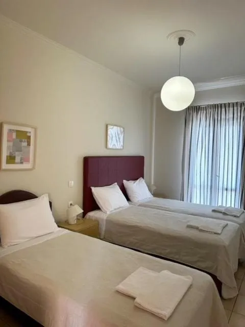 Bed in Antonia Apartments