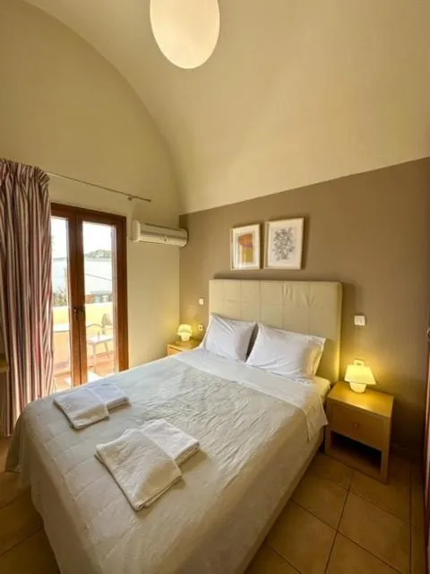Bed in Antonia Apartments