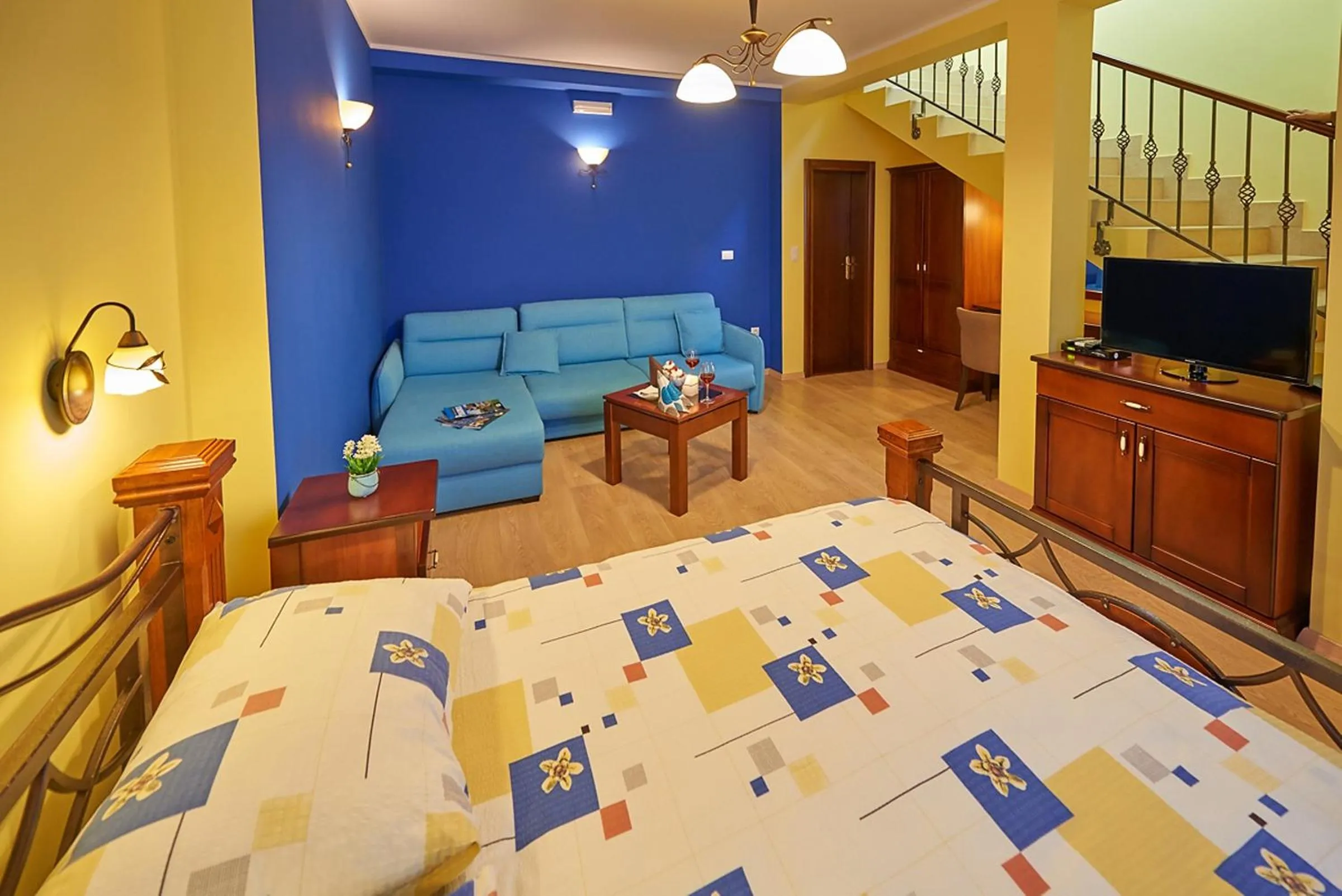 Living room, Bed in Hotel Laguna