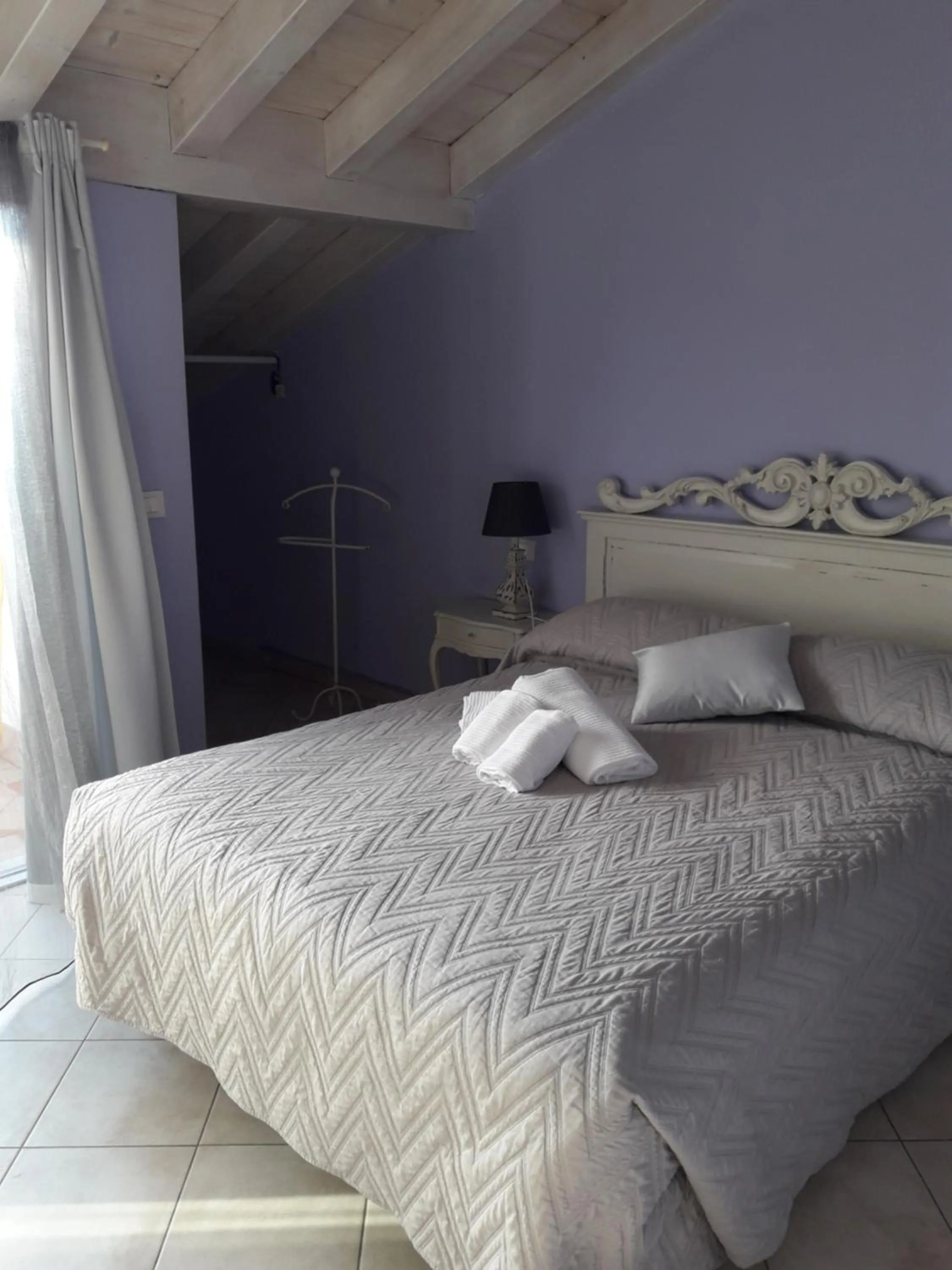 Bed in Le Rêve - Lake view rooms