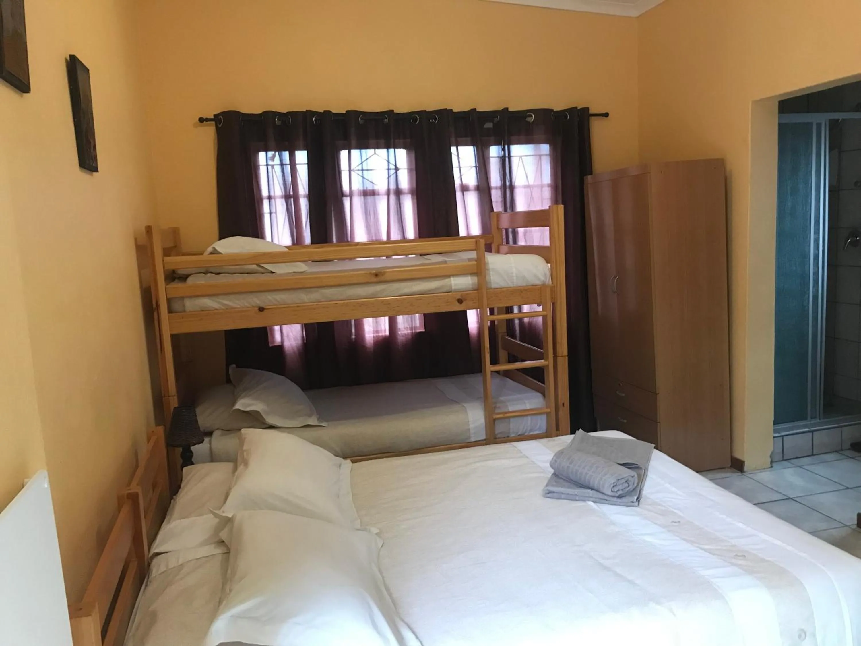 Bed in Lazy Gecko Accommodation