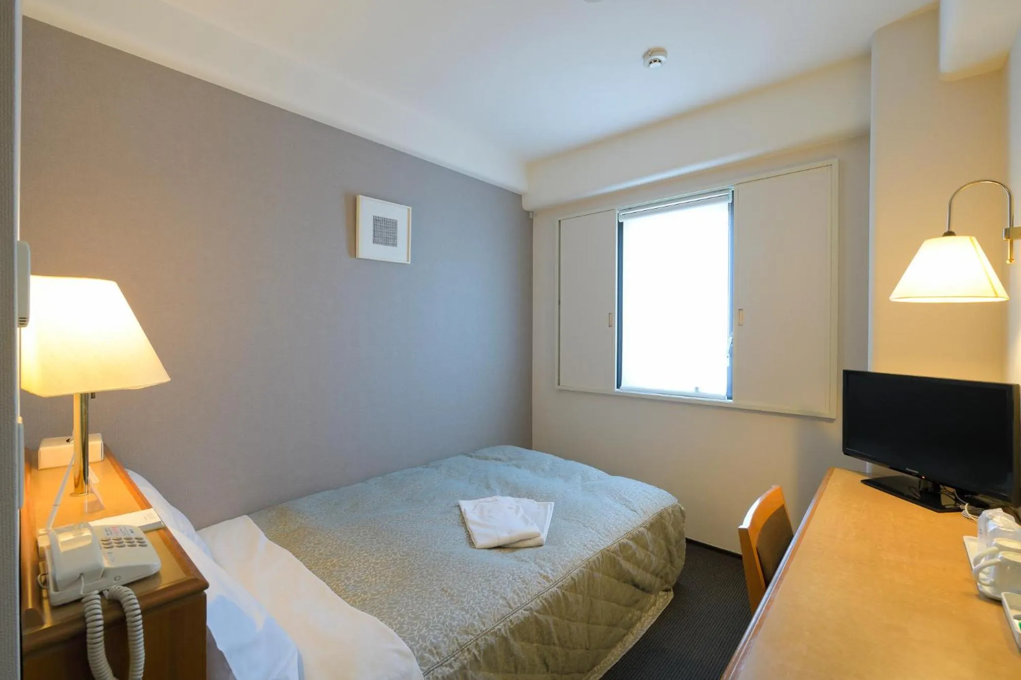 Bed in Shonandai Daiichi Hotel Fujisawa Yokohama