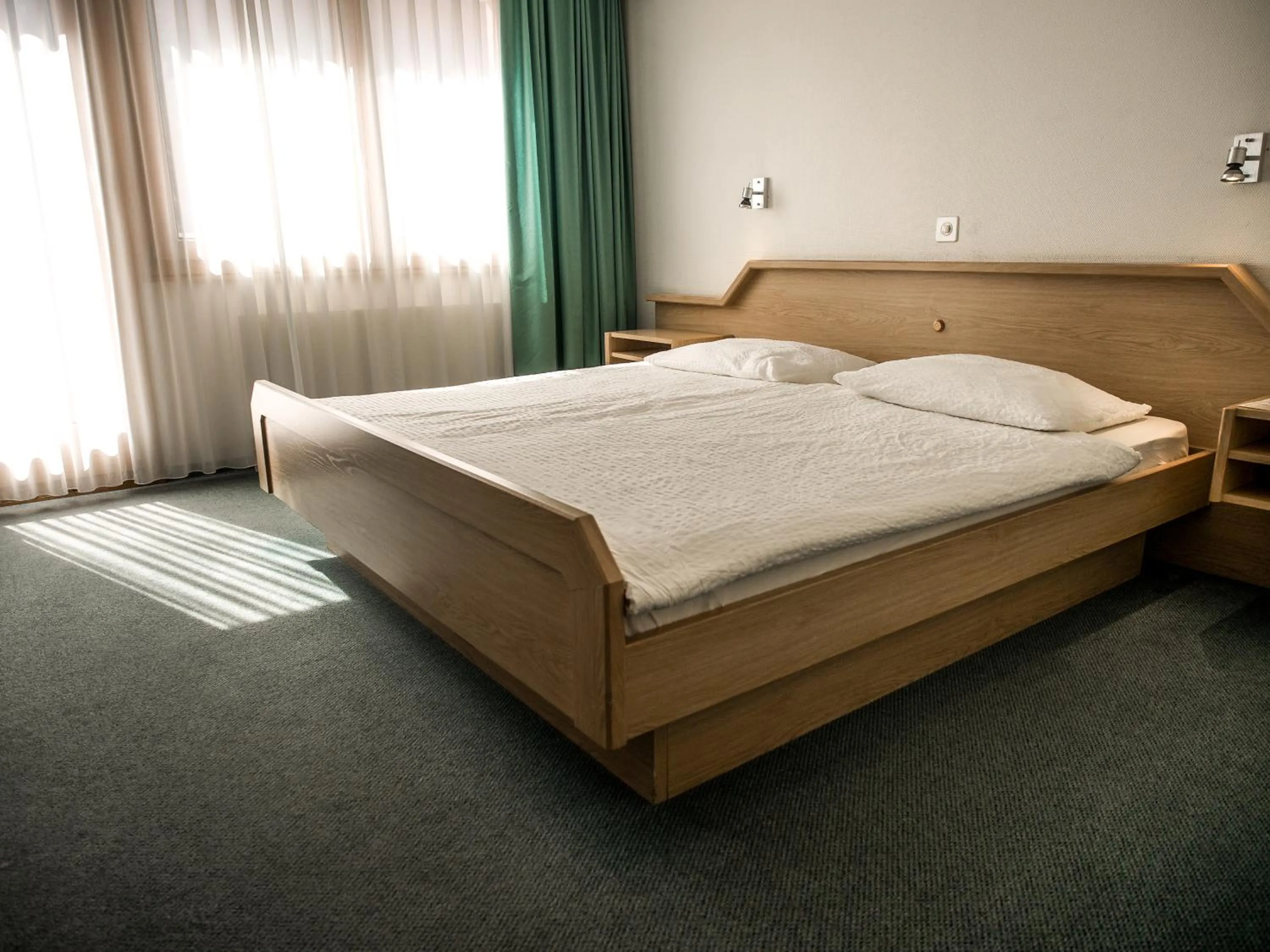 Bed in Hotel Olympica