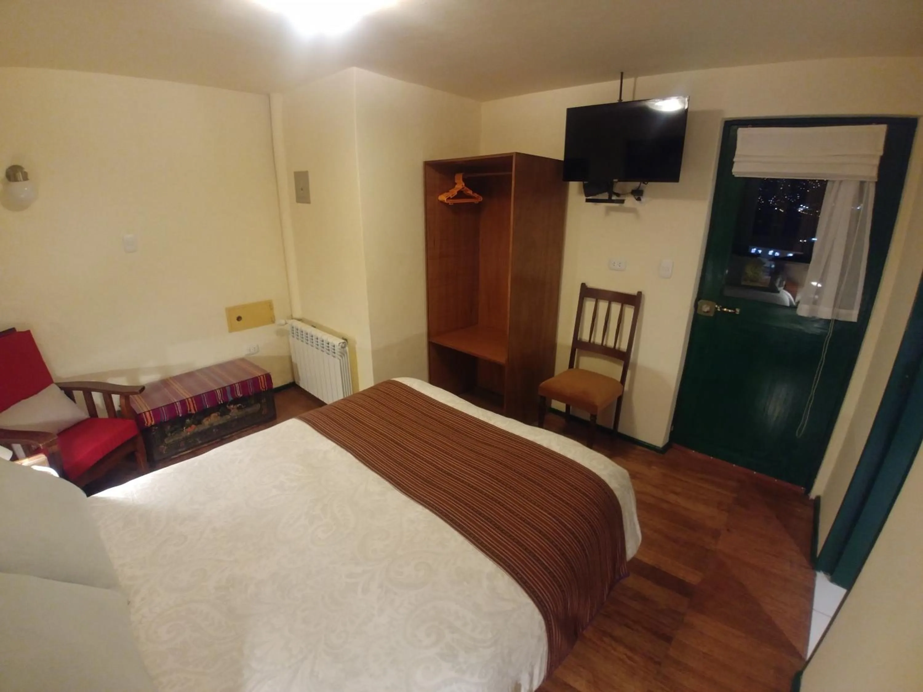 Photo of the whole room, Bed in Hostal Corihuasi