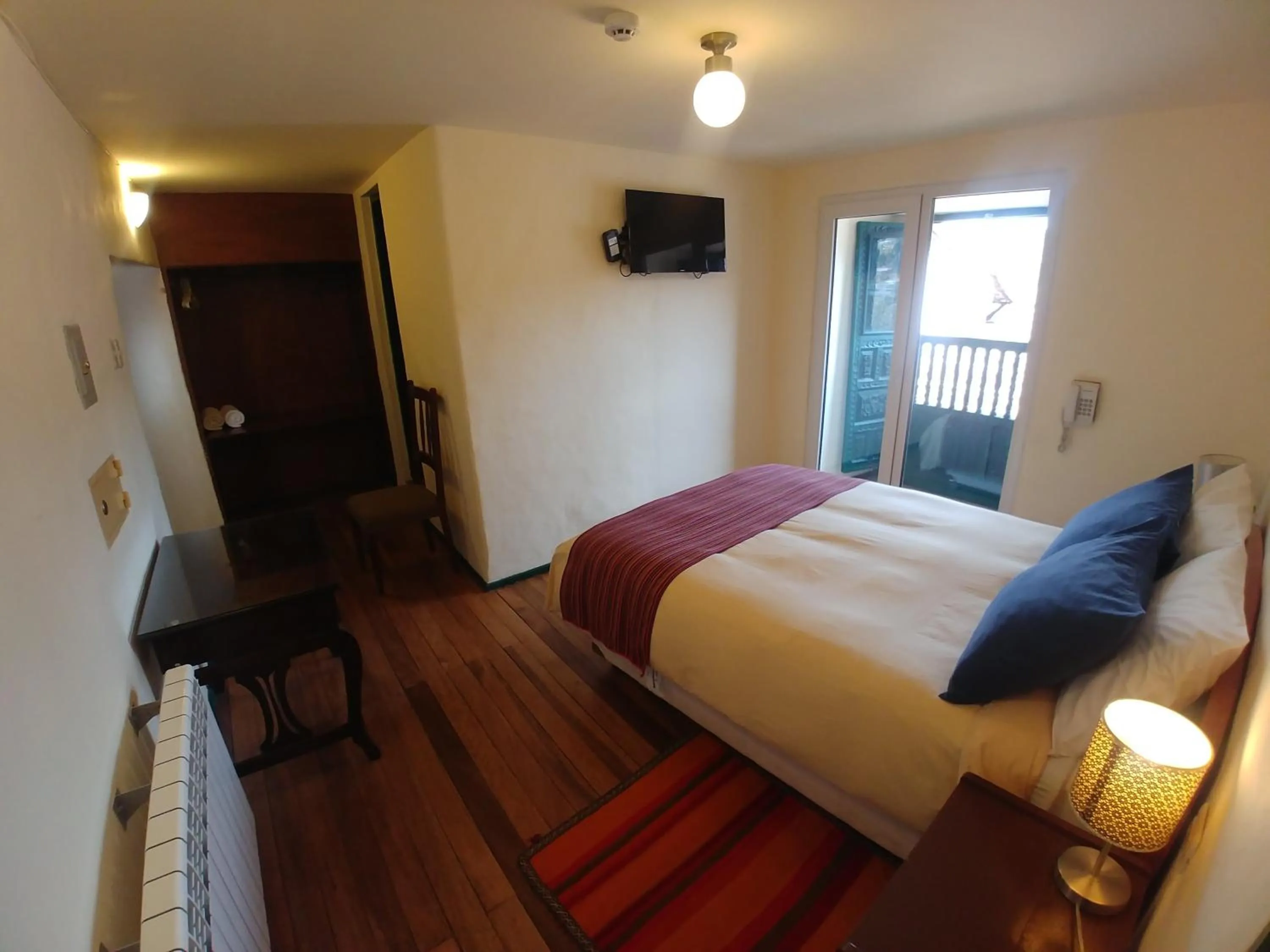 Photo of the whole room, Bed in Hostal Corihuasi