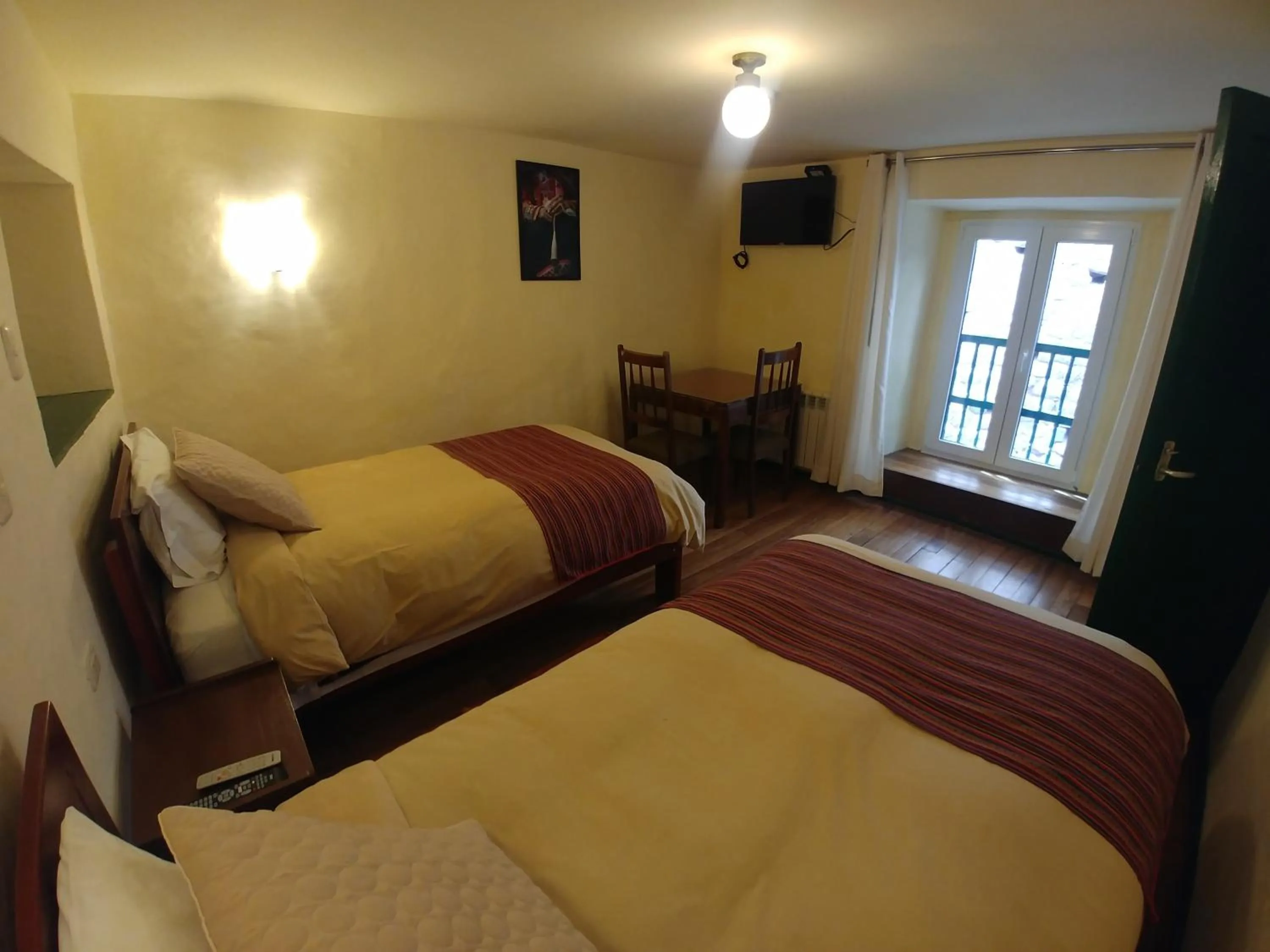 TV and multimedia, Bed in Hostal Corihuasi