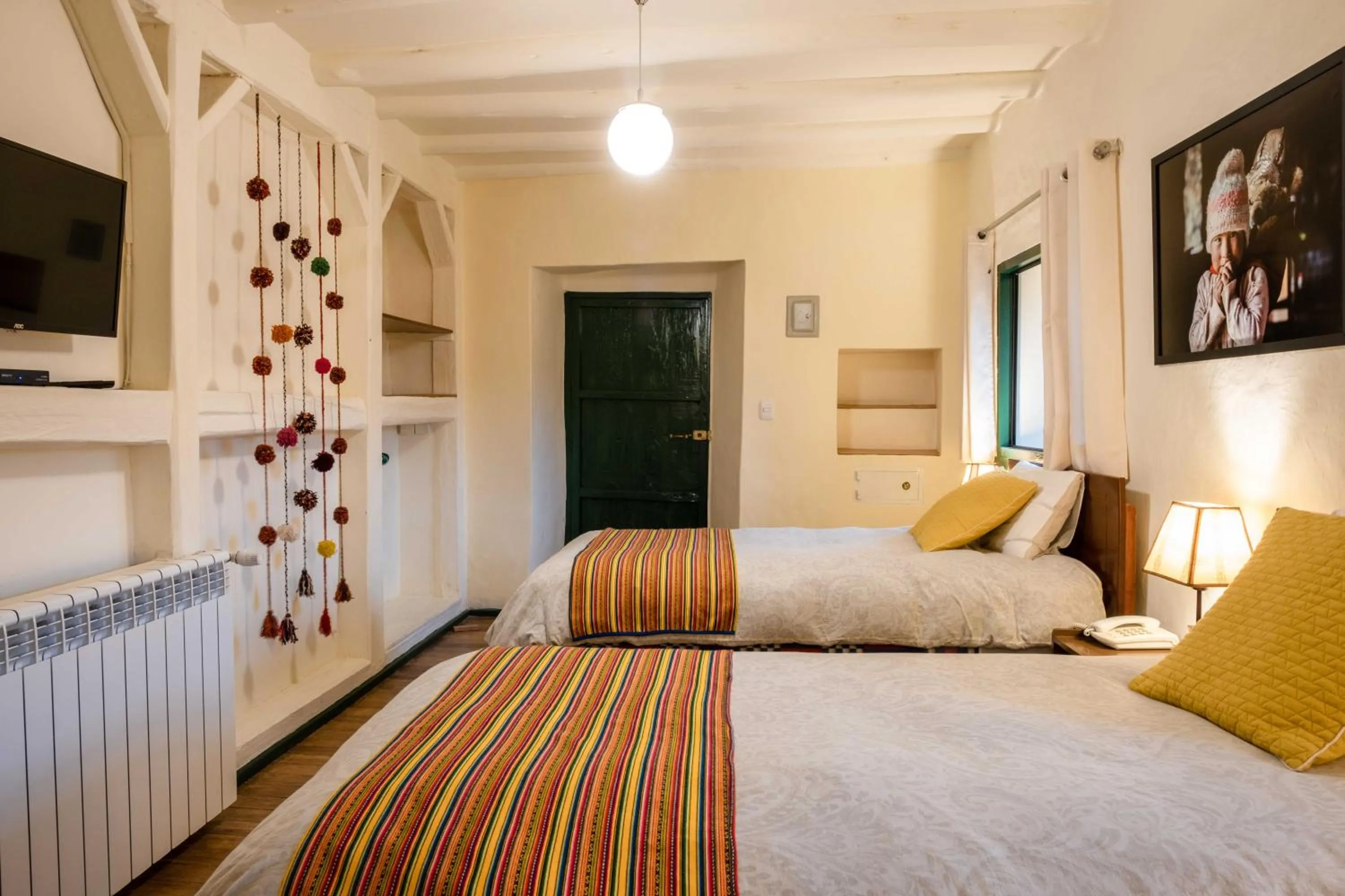 TV and multimedia, Bed in Hostal Corihuasi