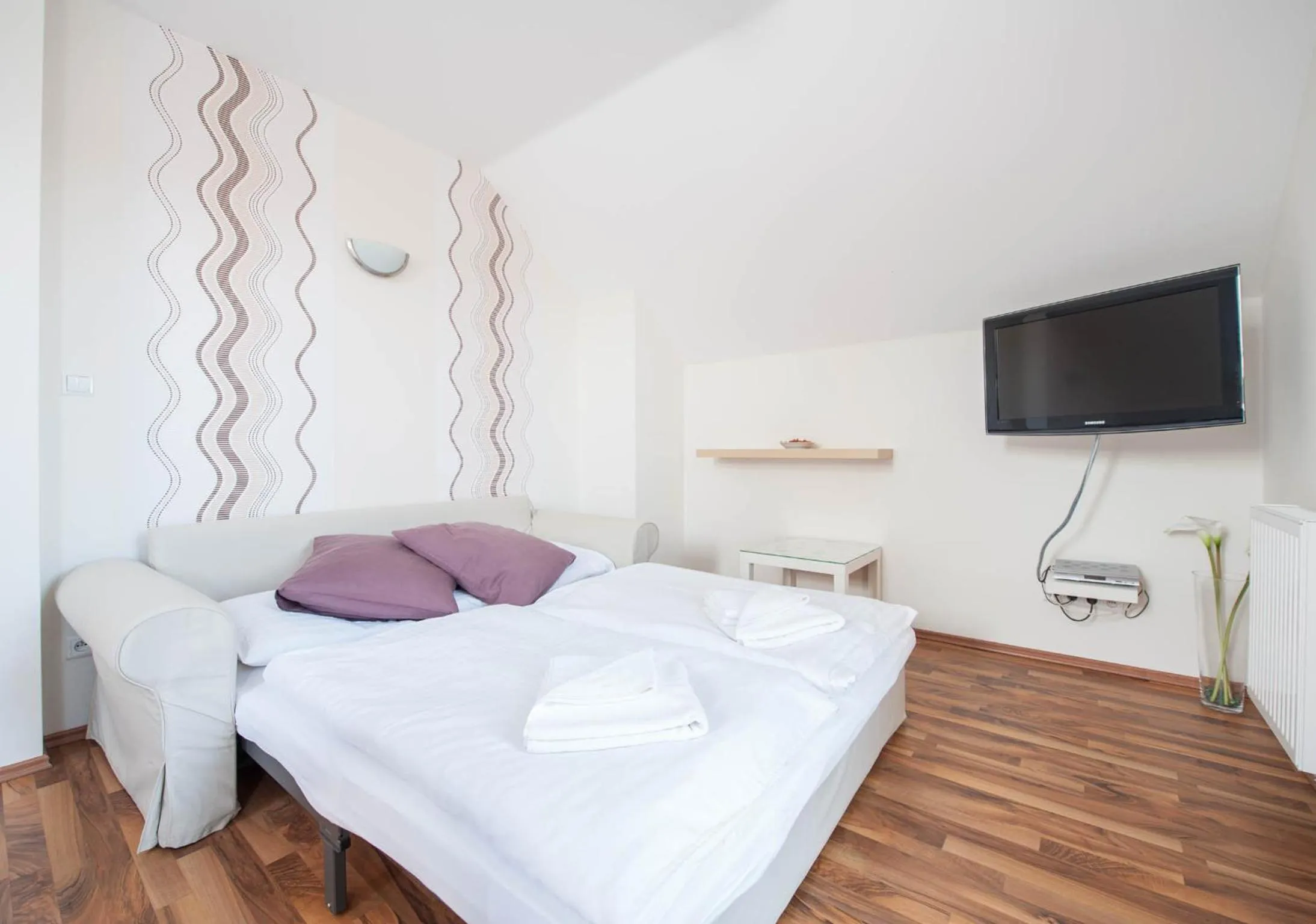 Living room, Bed in Hotel Garni Pod Skalkou