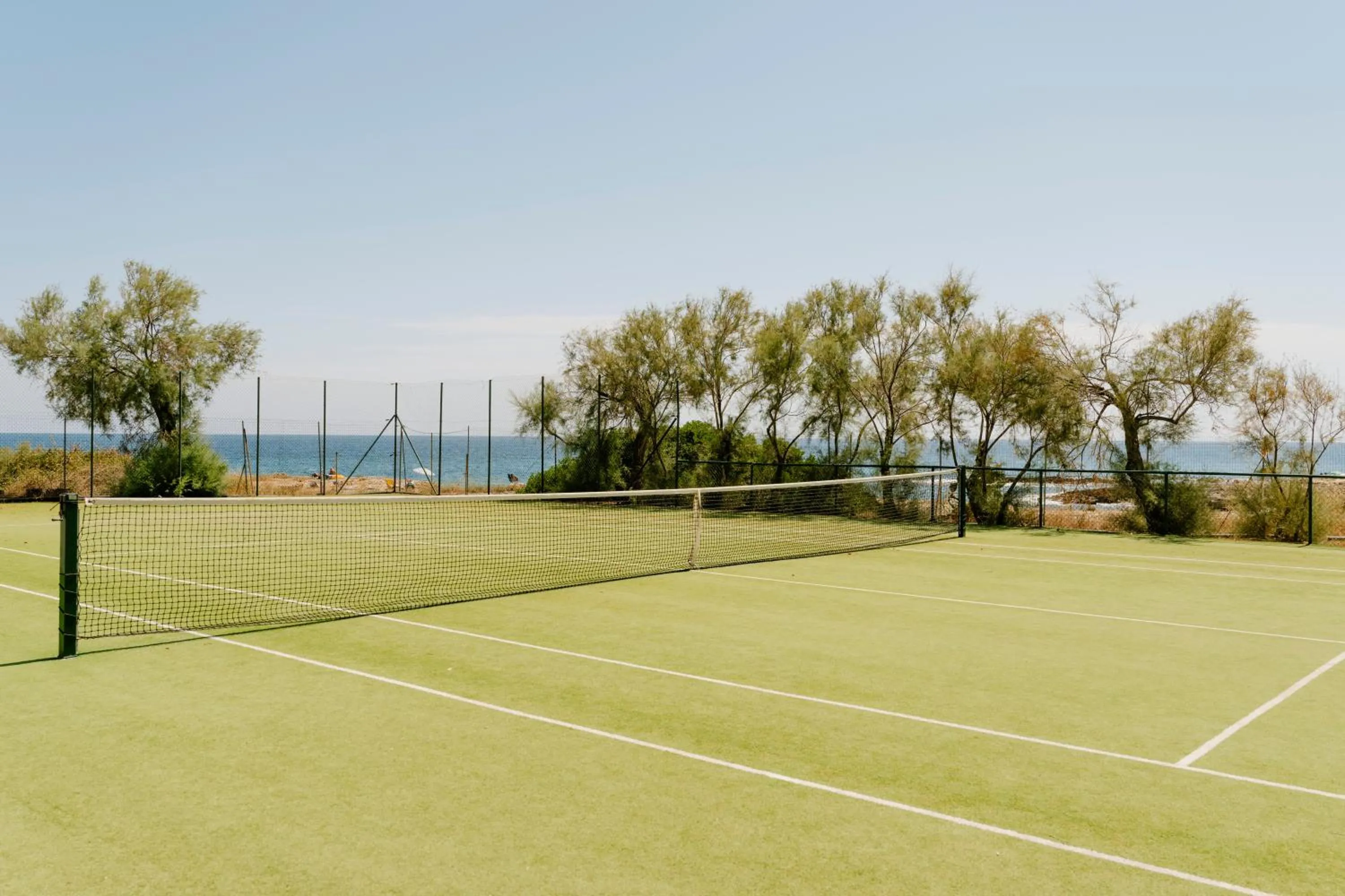 Tennis court in Torre Cintola Greenblu Sea Emotions