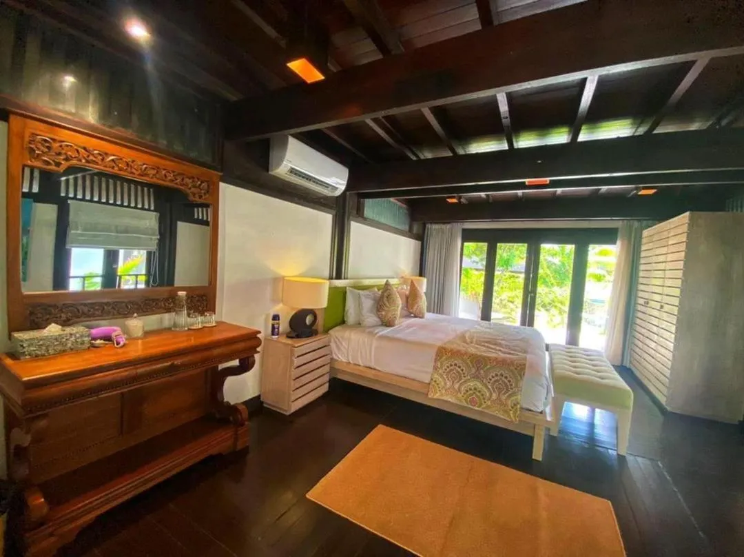 Bed in Kudat Riviera Exclusive Beach Villas