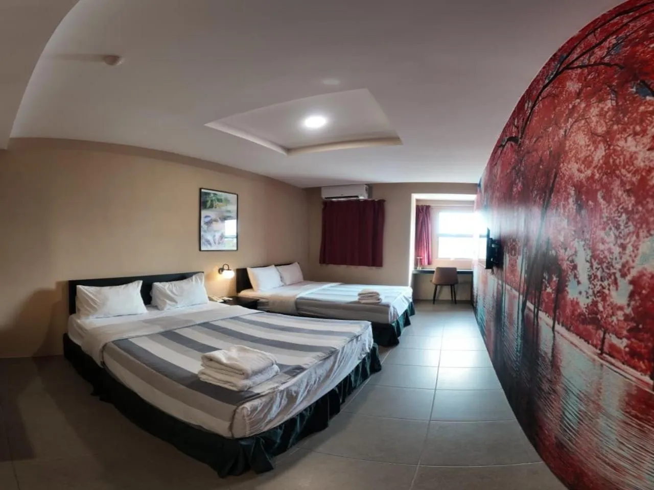 Bed in Metroinn Hotel