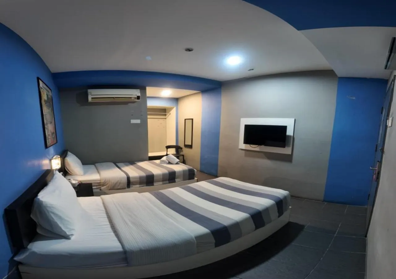 Bed in Metroinn Hotel