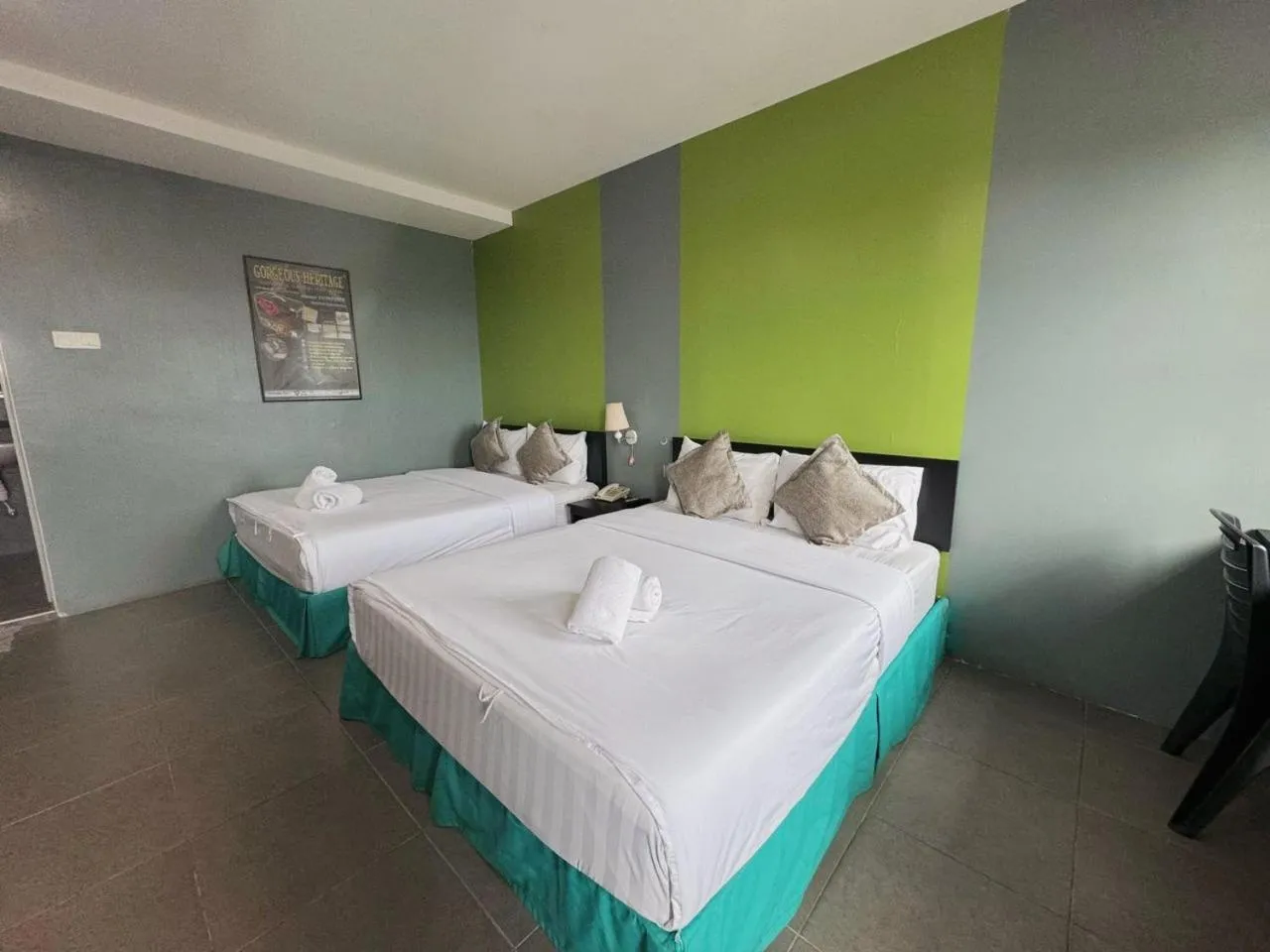 Bed in Metroinn Hotel