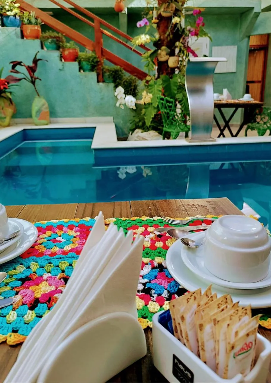 Pool view in Pousada Tô na Praia Juquehy
