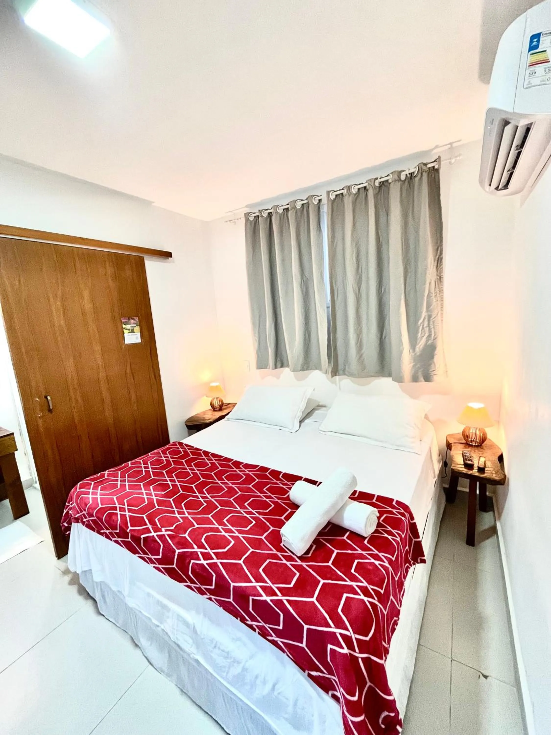 Bed in Pousada Tô na Praia Juquehy