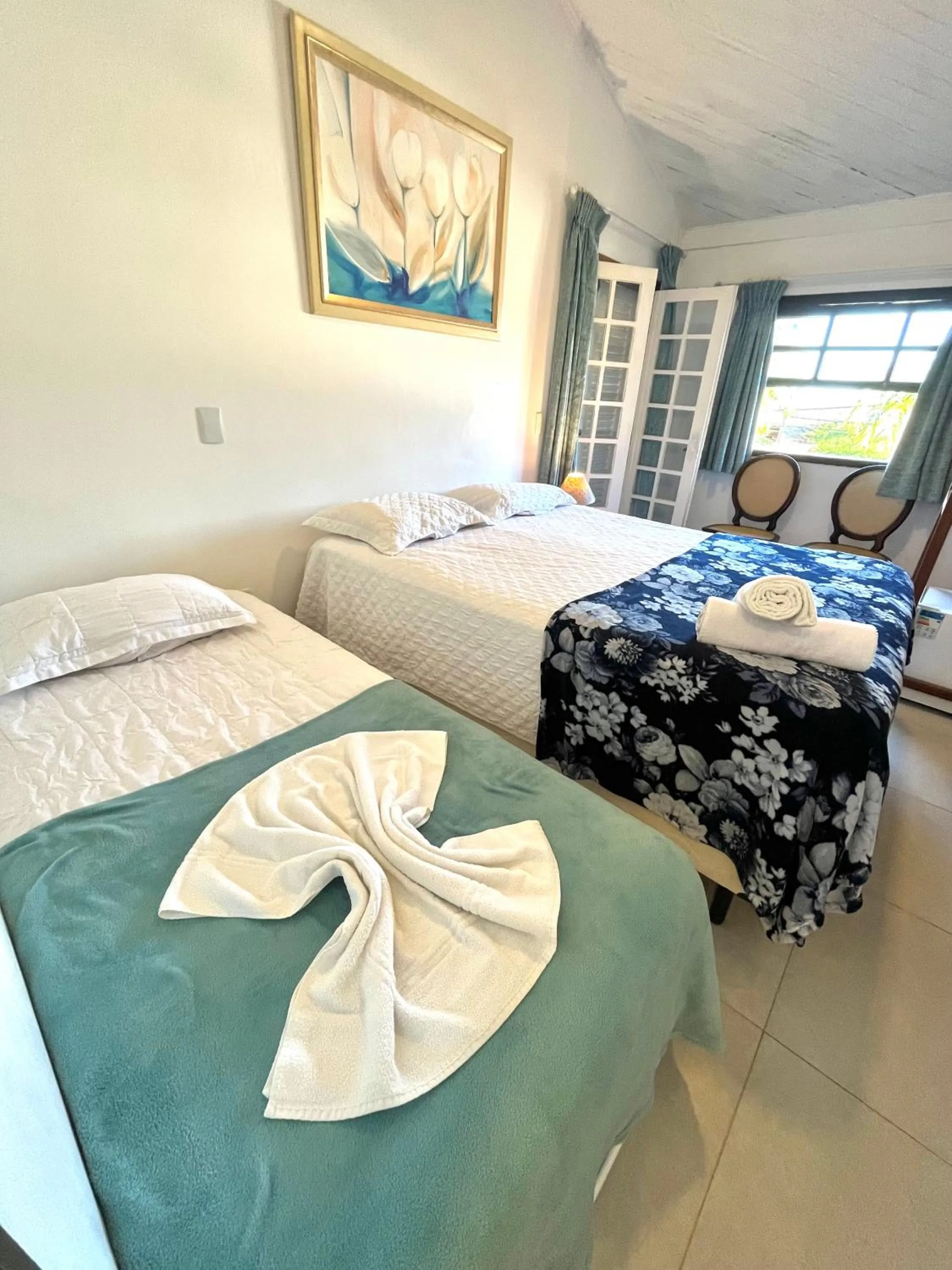 Bed in Pousada Tô na Praia Juquehy