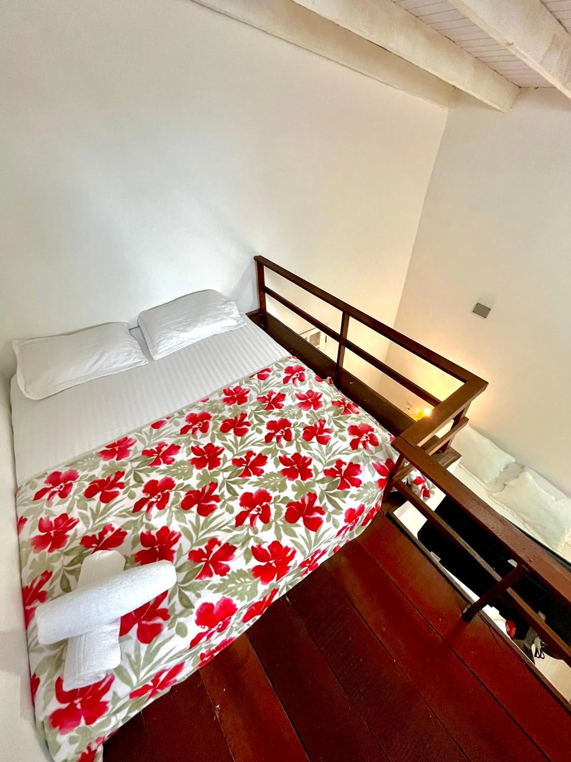 Bed in Pousada Tô na Praia Juquehy