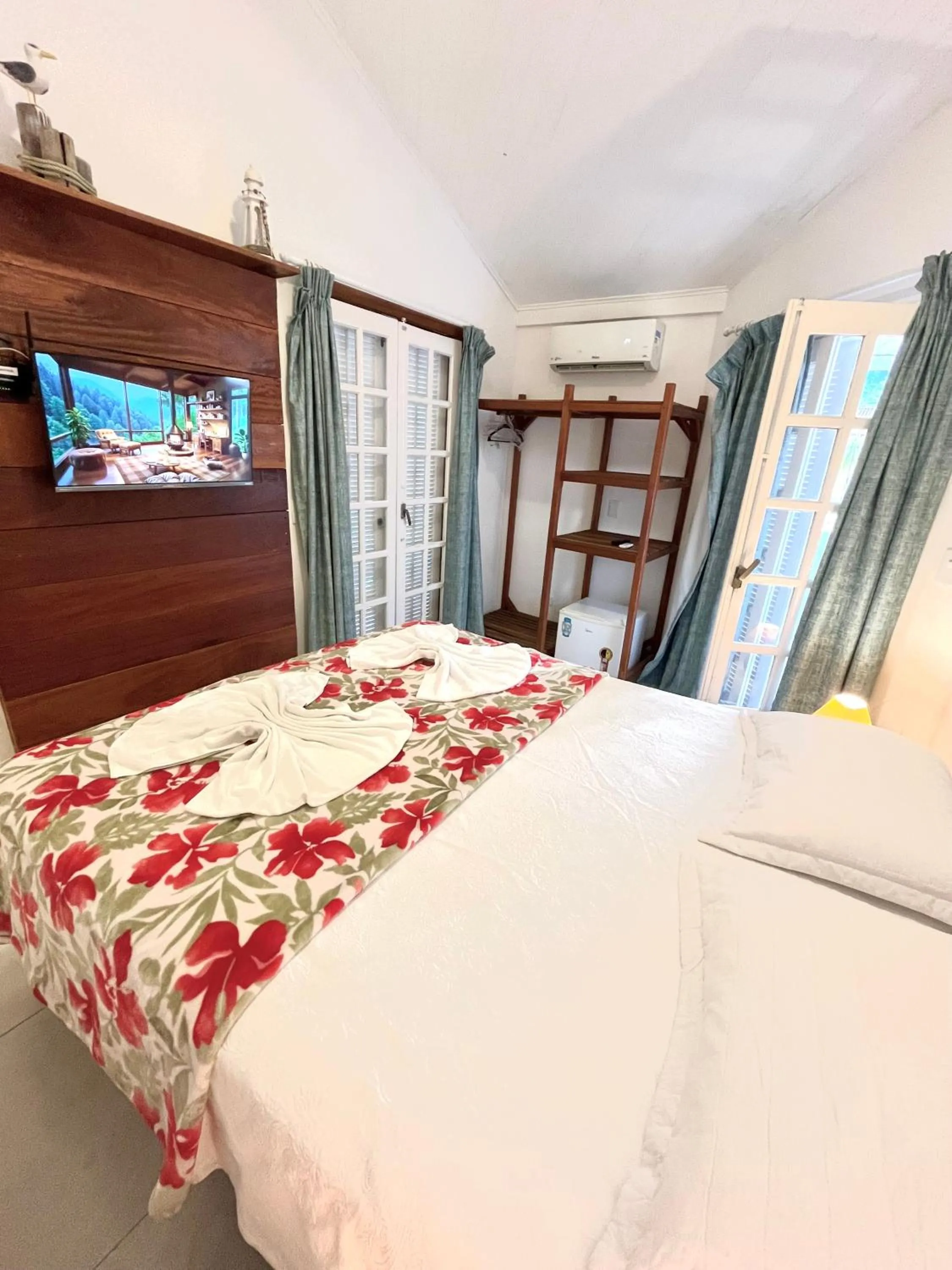 Bed in Pousada Tô na Praia Juquehy