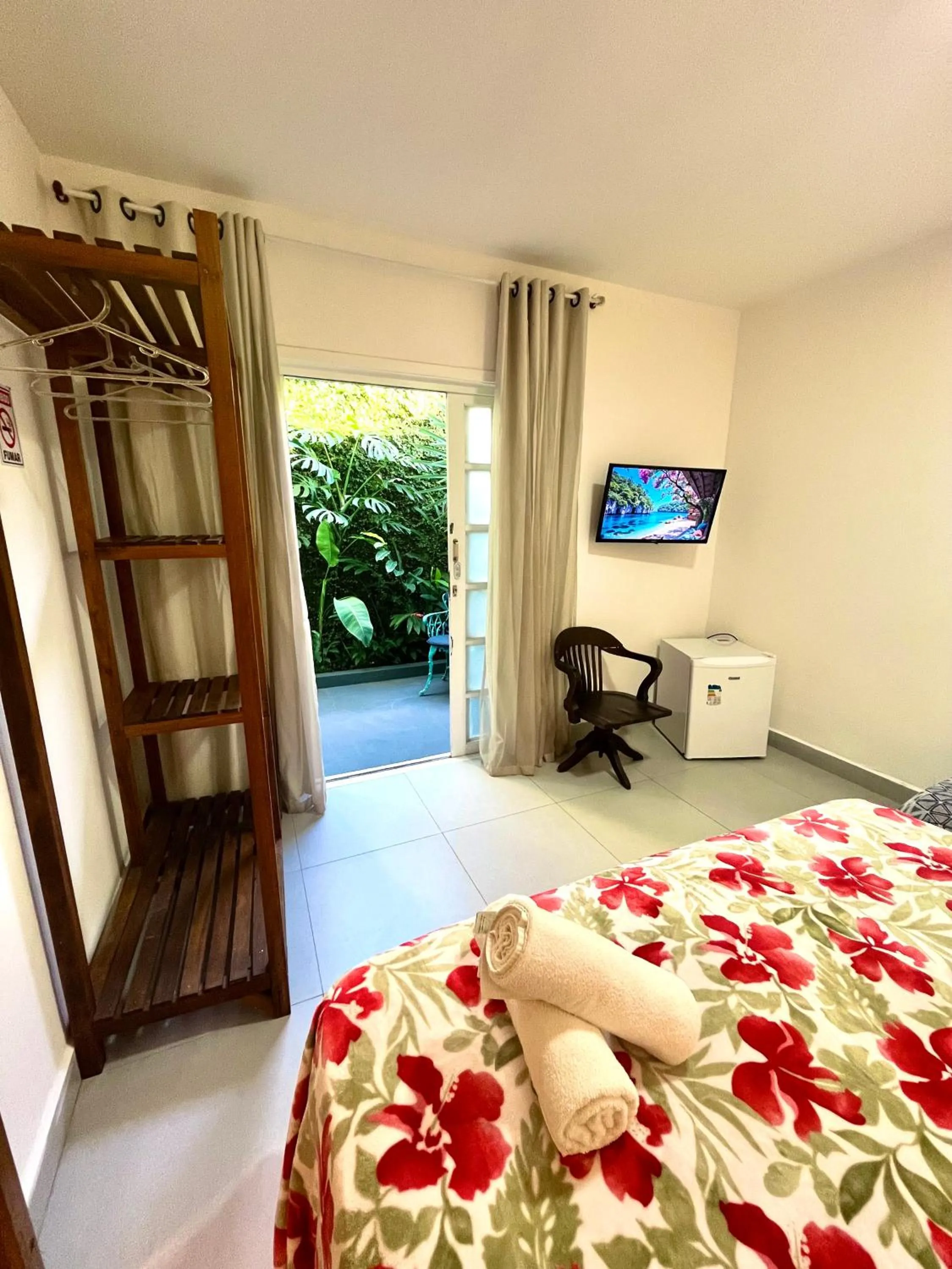 Bed in Pousada Tô na Praia Juquehy