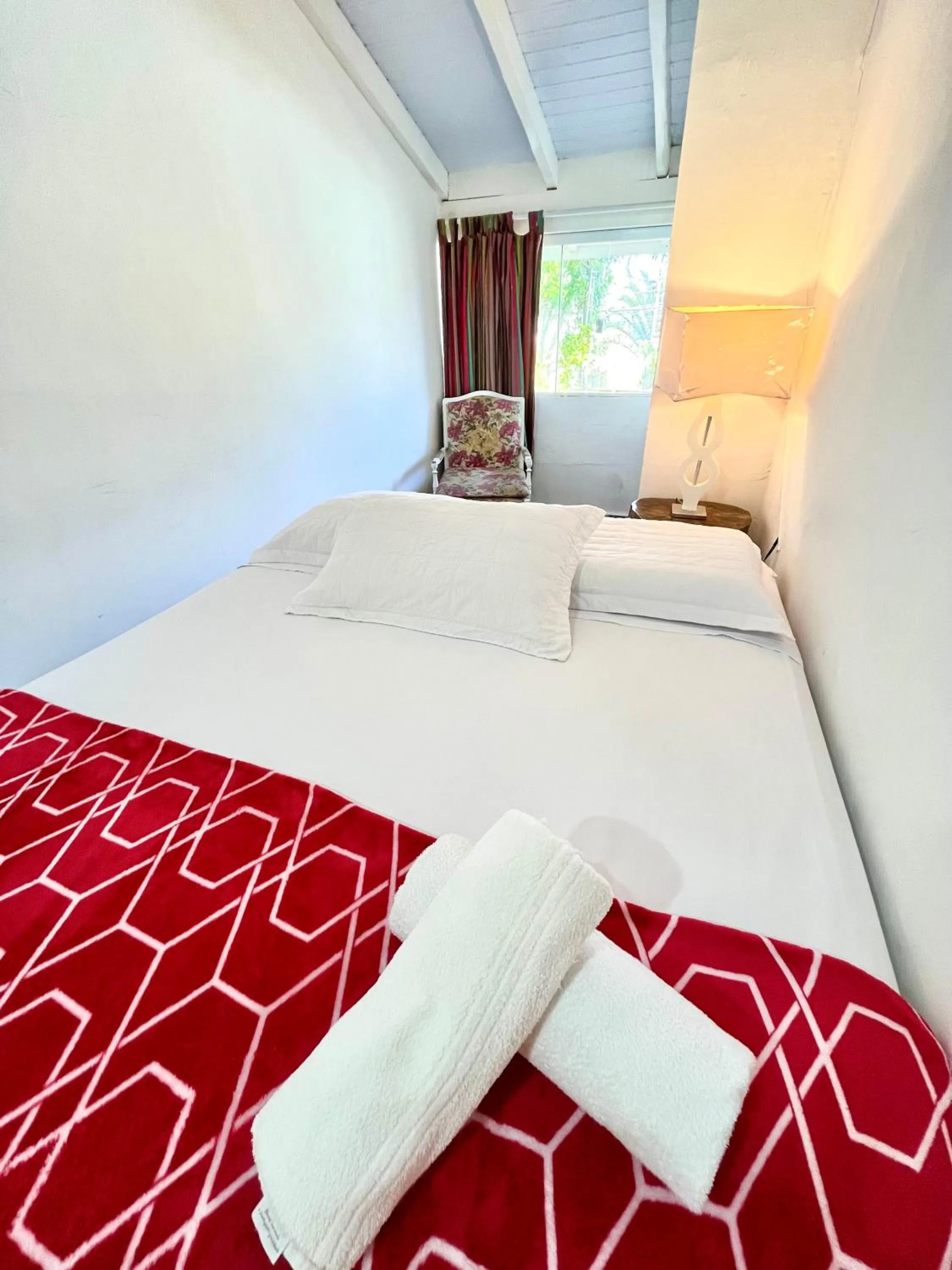 Bed in Pousada Tô na Praia Juquehy