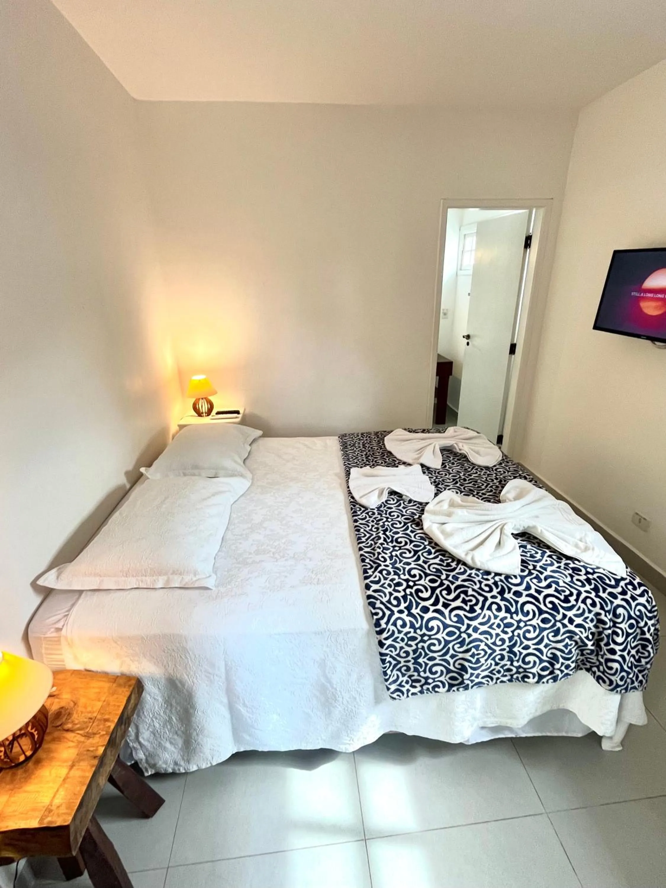 Bed in Pousada Tô na Praia Juquehy