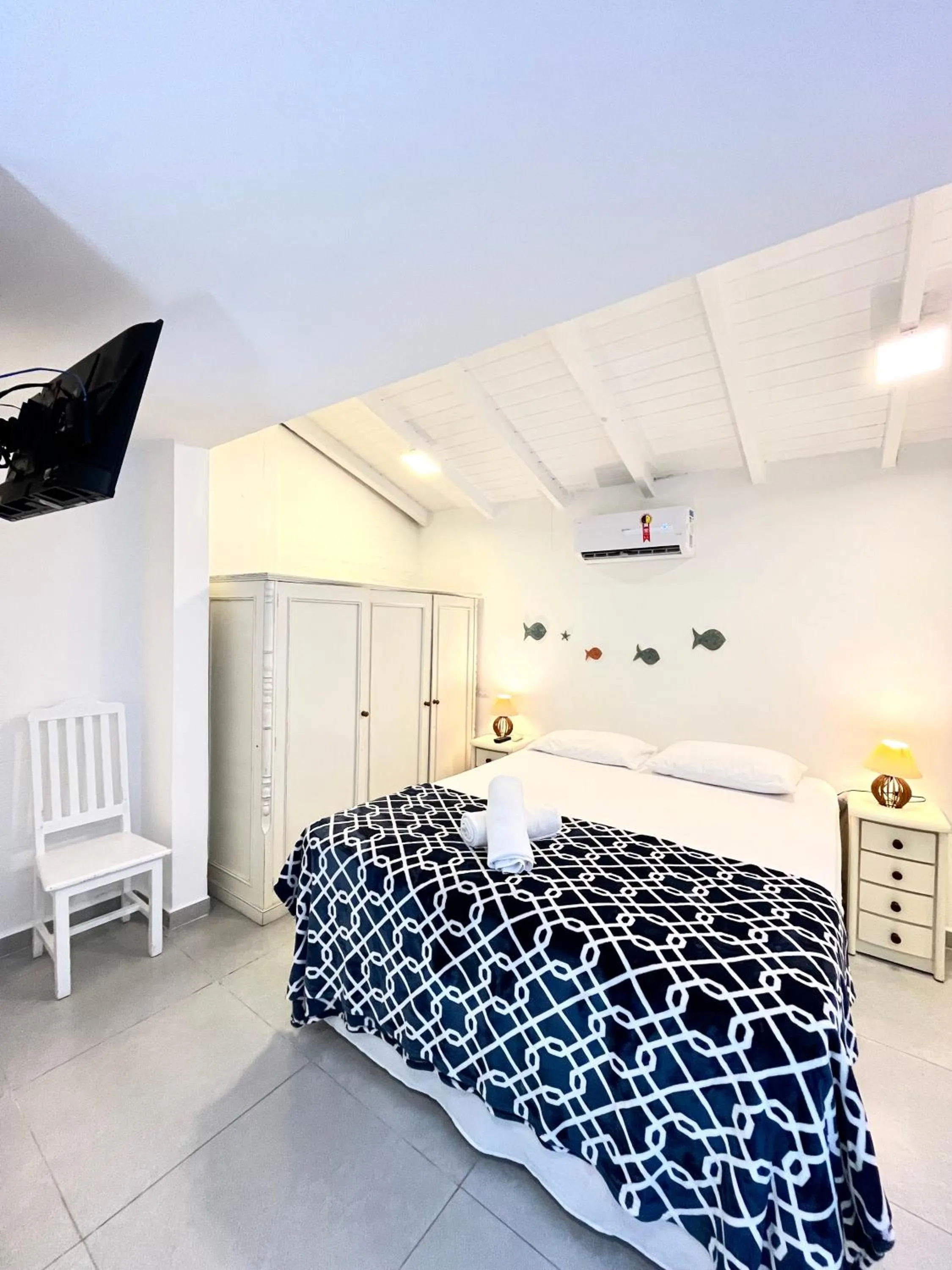 Bed in Pousada Tô na Praia Juquehy