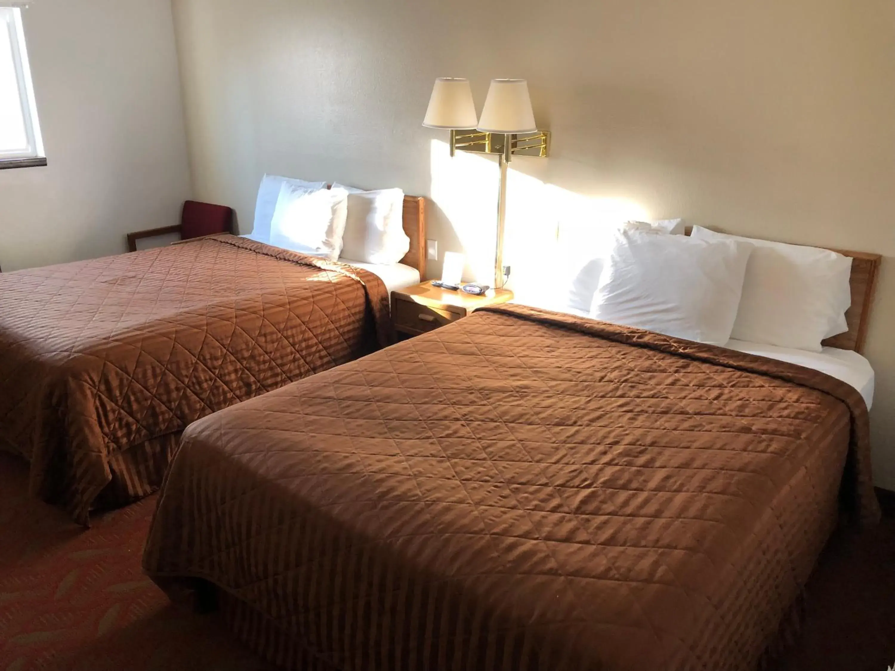 Bed in Americas Best Value Inn and Suites Sidney Bed in Americas Best Value Inn and Suites Sidney