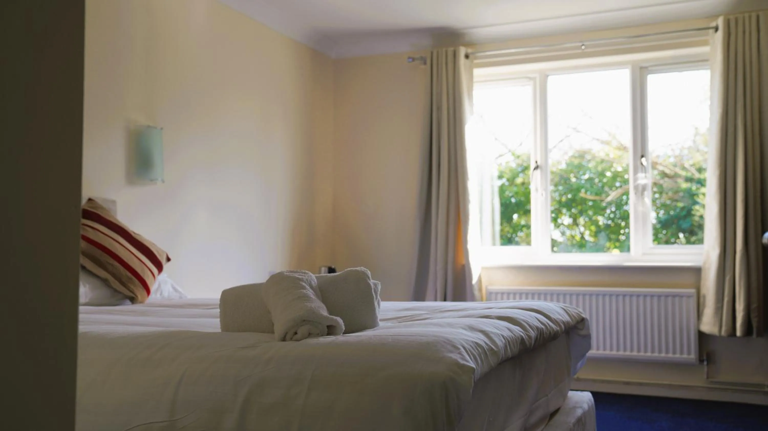 Photo of the whole room, Bed in The New Chichester Hotel