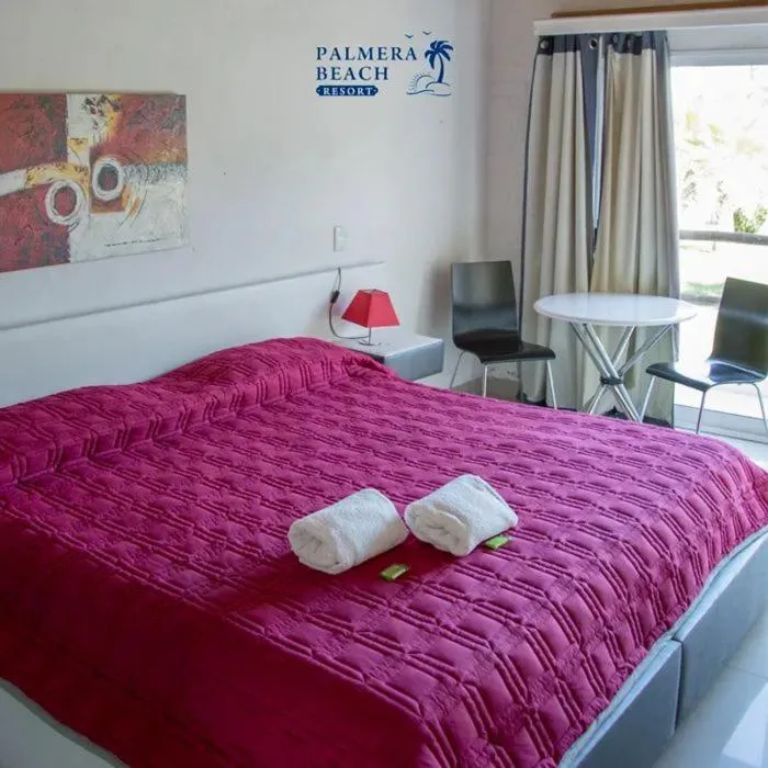 Bed in Palmeras Beach Hotel
