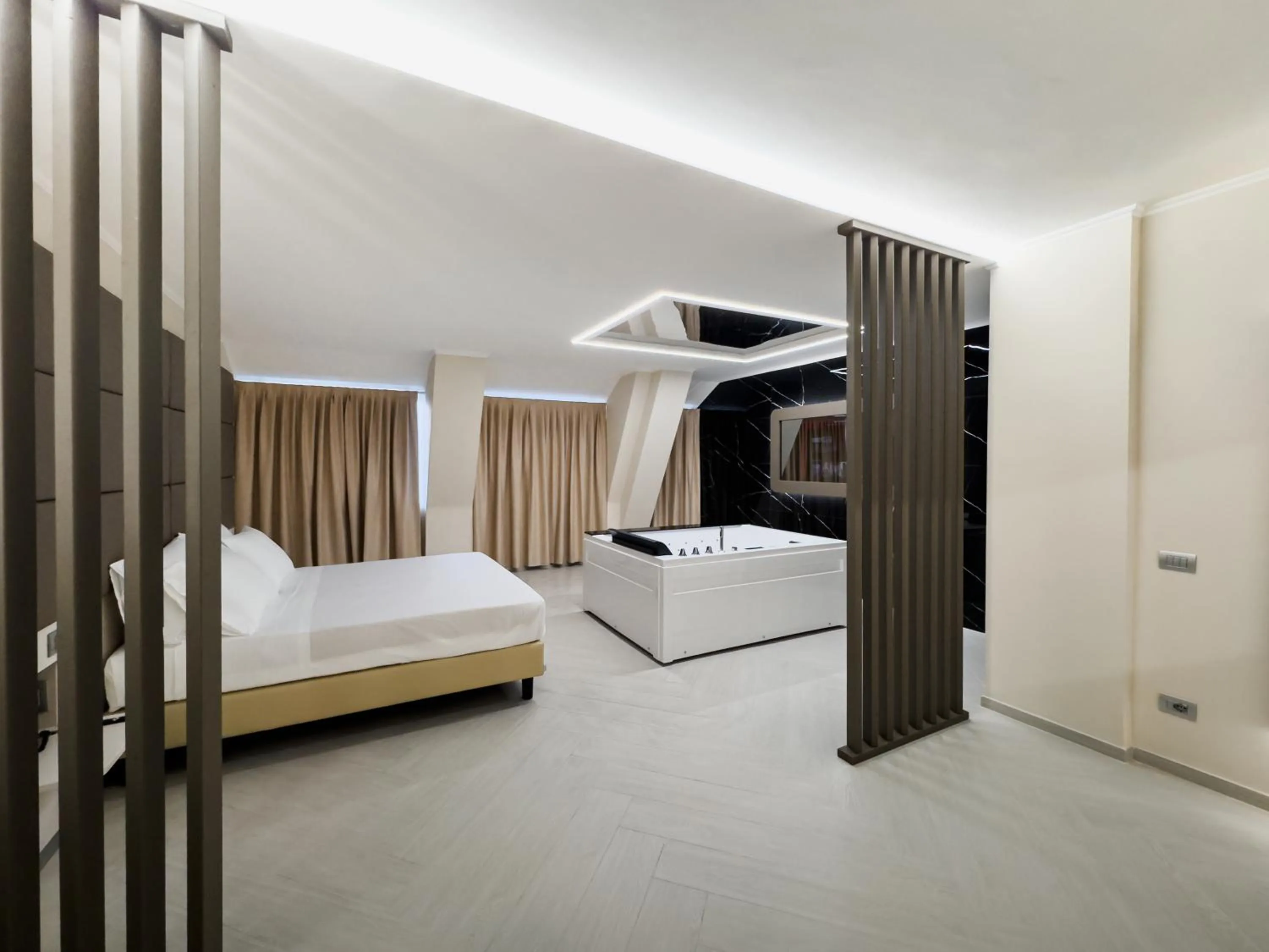 Bed in Grand Hotel Europa