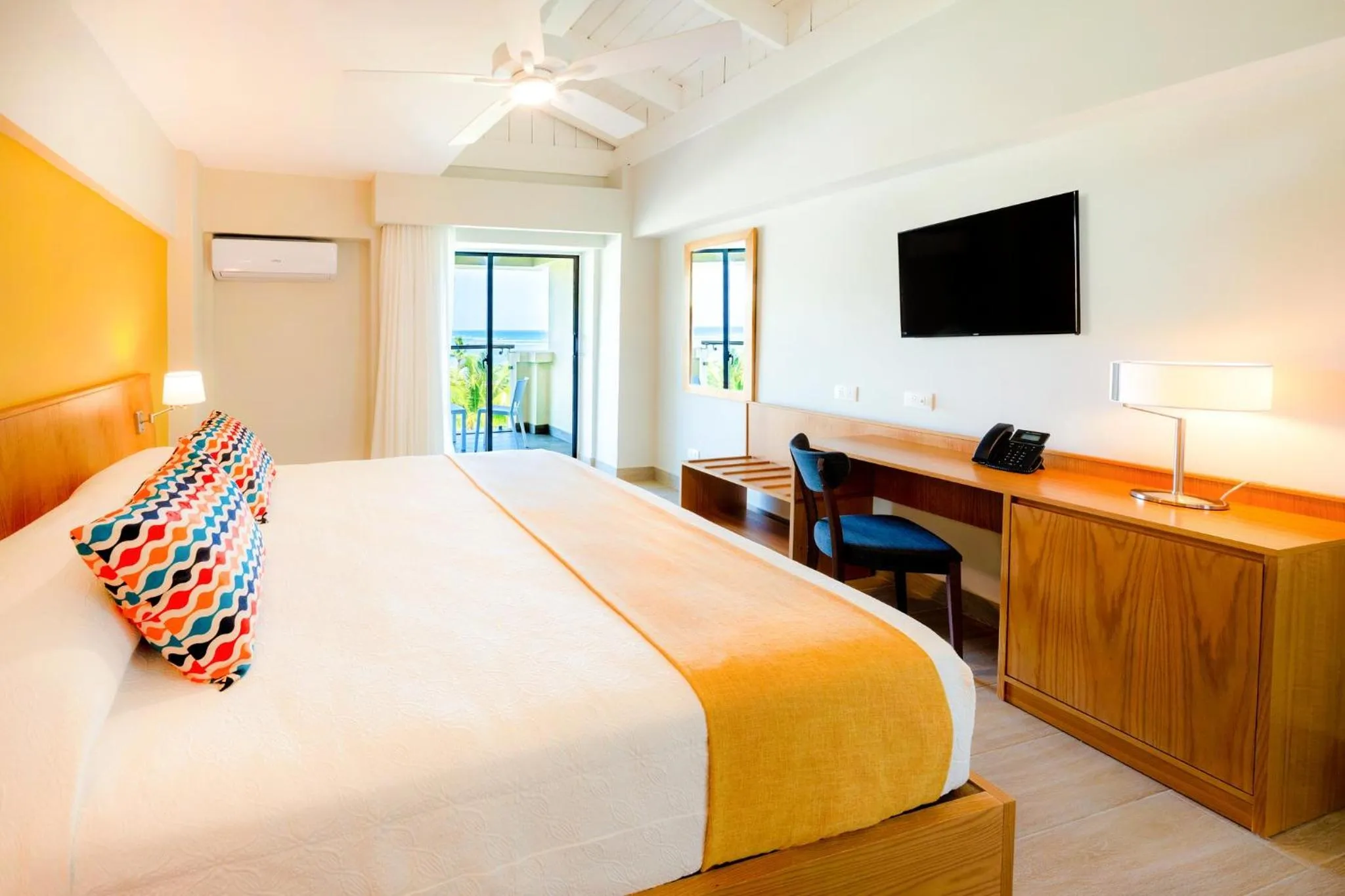 Bed in Coral Costa Caribe Beach Resort - All Inclusive