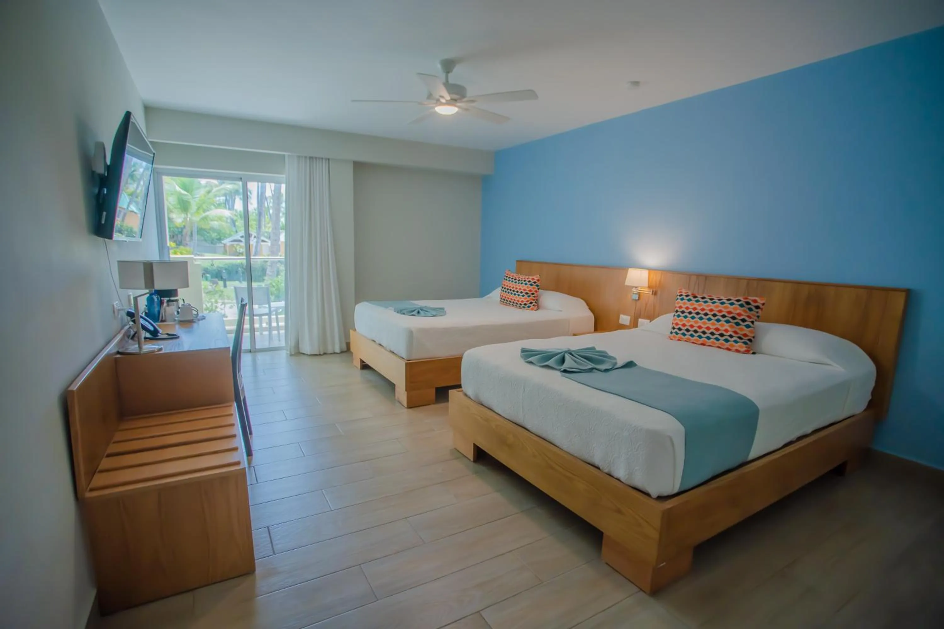 Bed in Coral Costa Caribe Beach Resort - All Inclusive