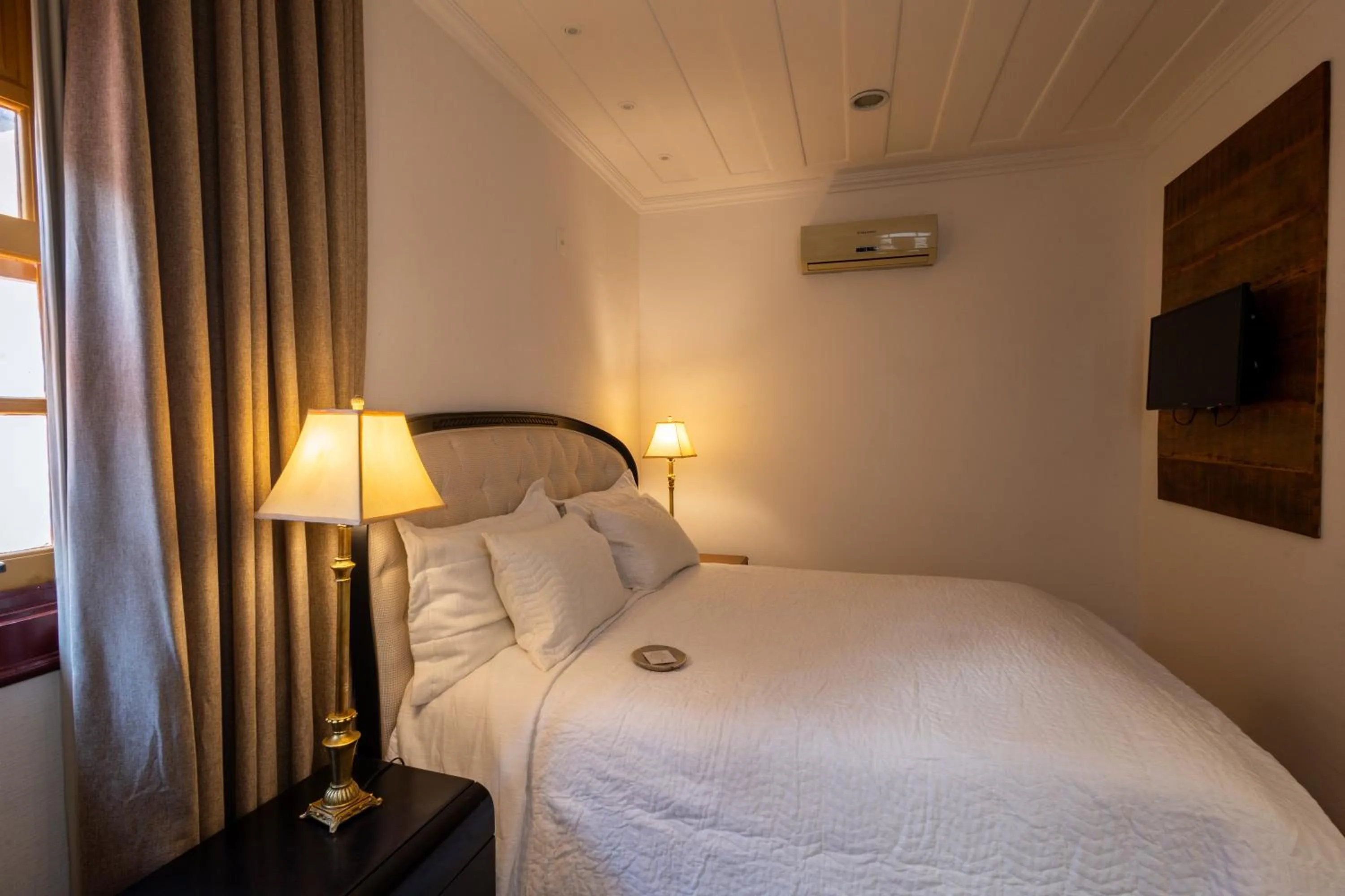 Bedroom, Bed in Pousada Pequena Tiradentes