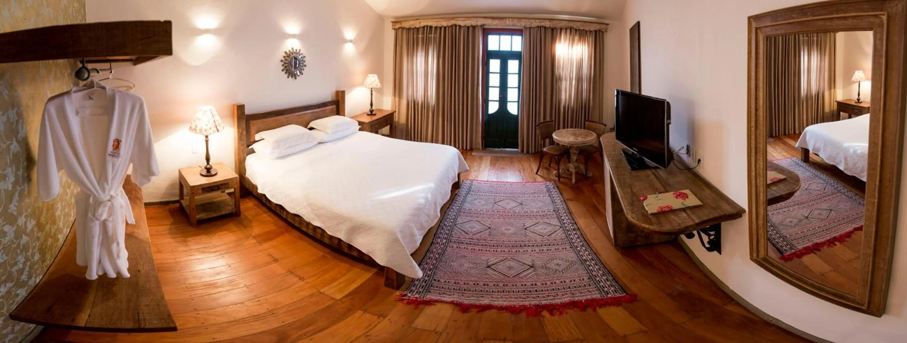 Bed in Pousada Pequena Tiradentes