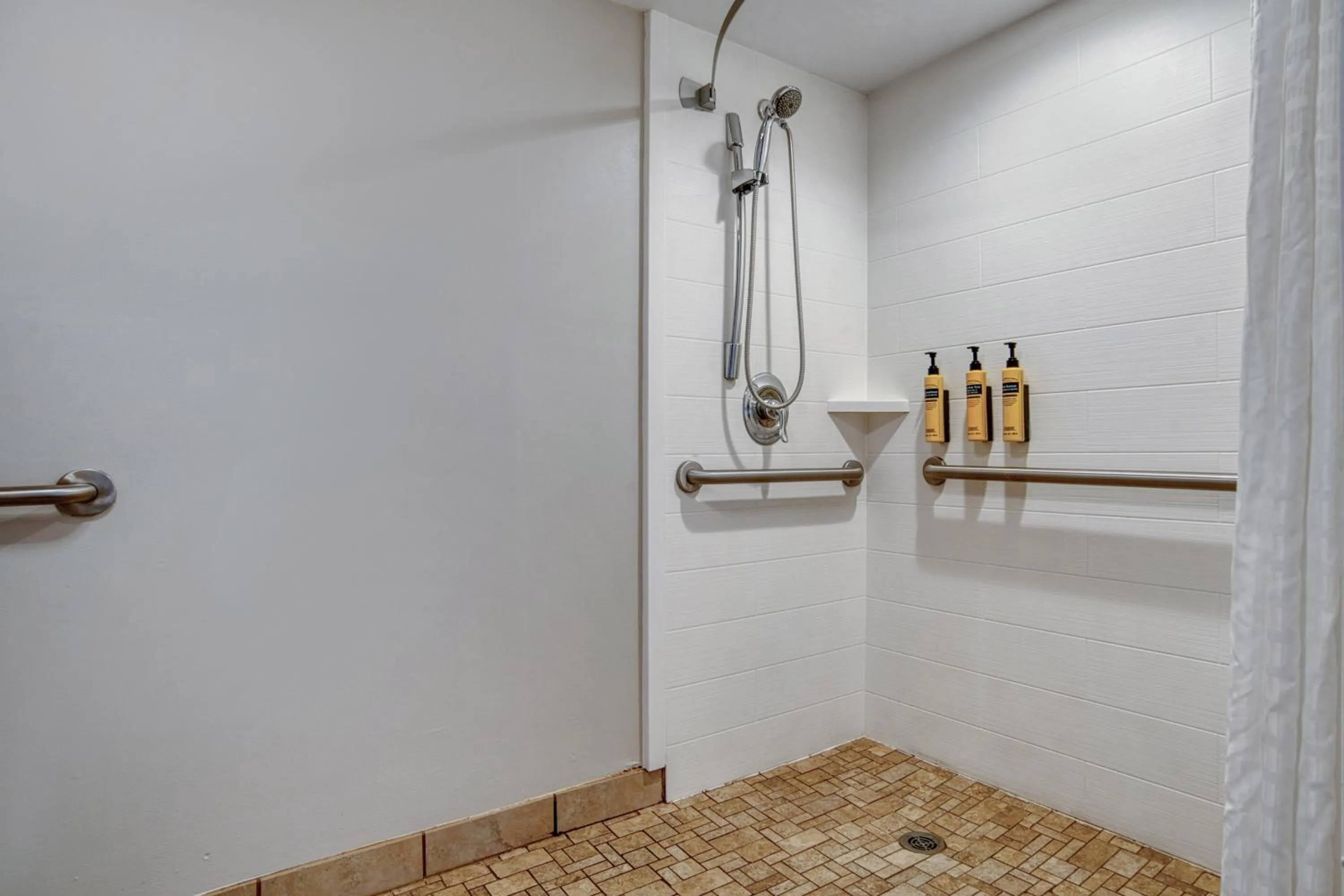 Shower in Best Western Plus French Quarter Courtyard Hotel