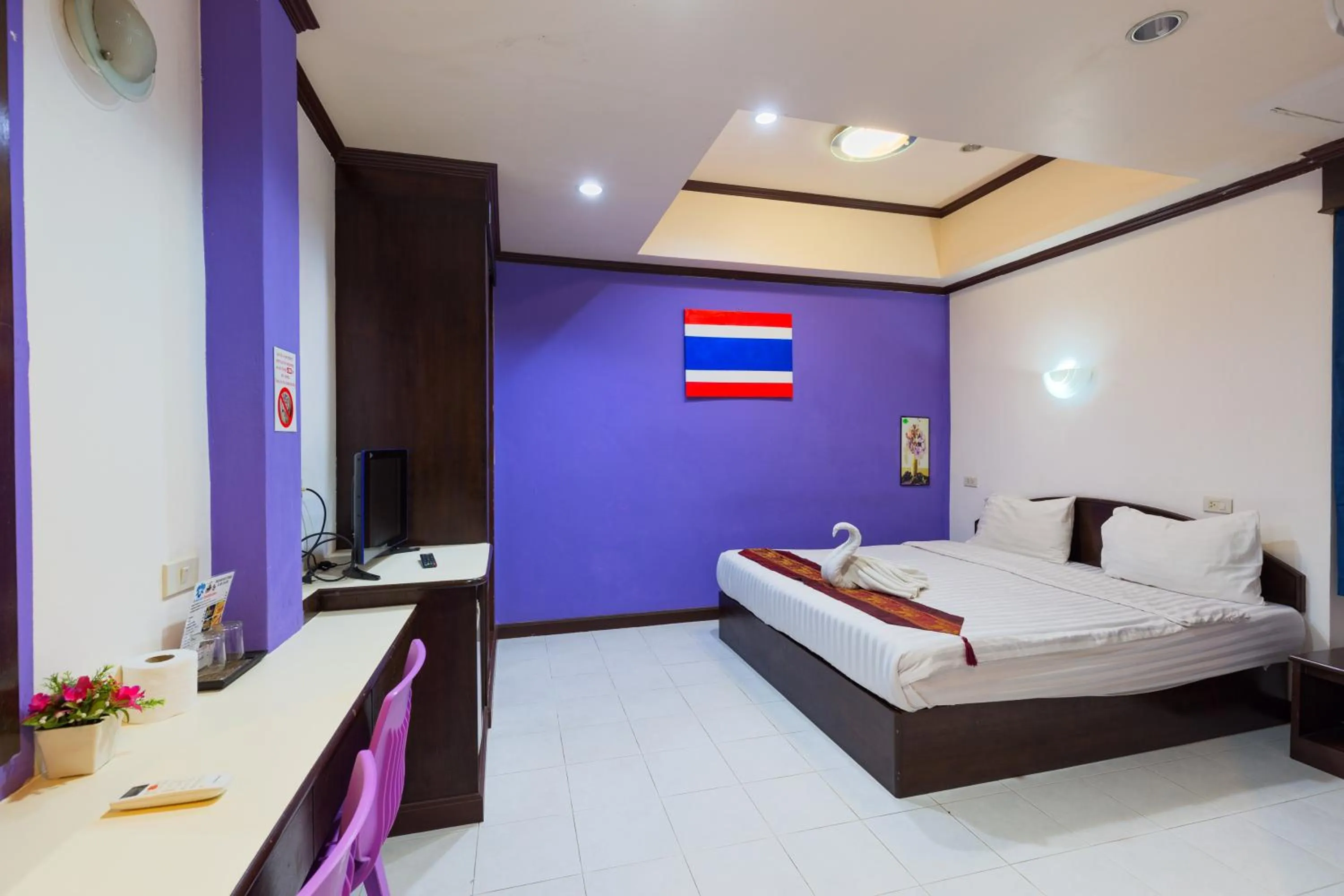 Photo of the whole room, Bed in Grand Orchid Inn Patong beach