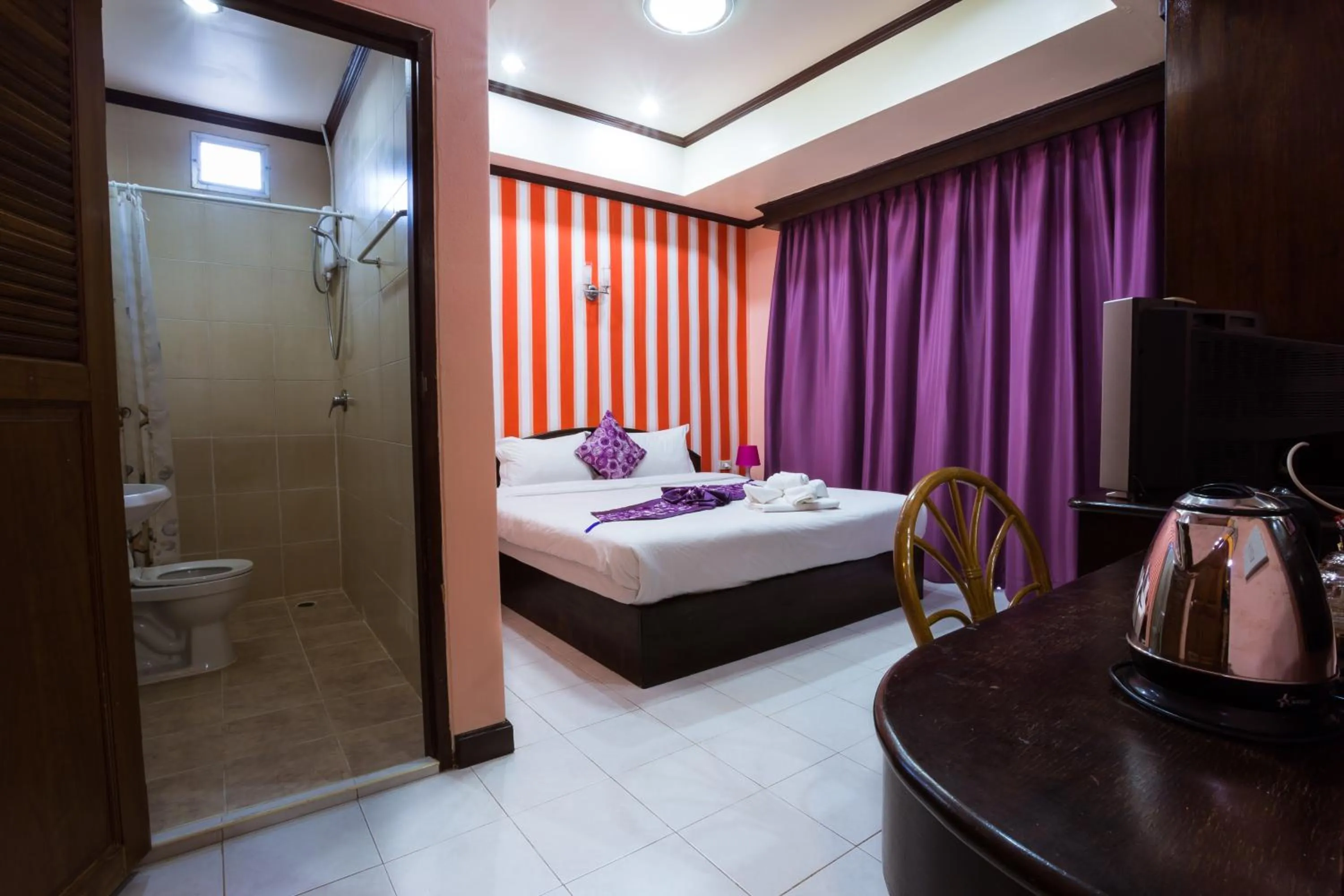 Coffee/tea facilities, Bed in Grand Orchid Inn Patong beach