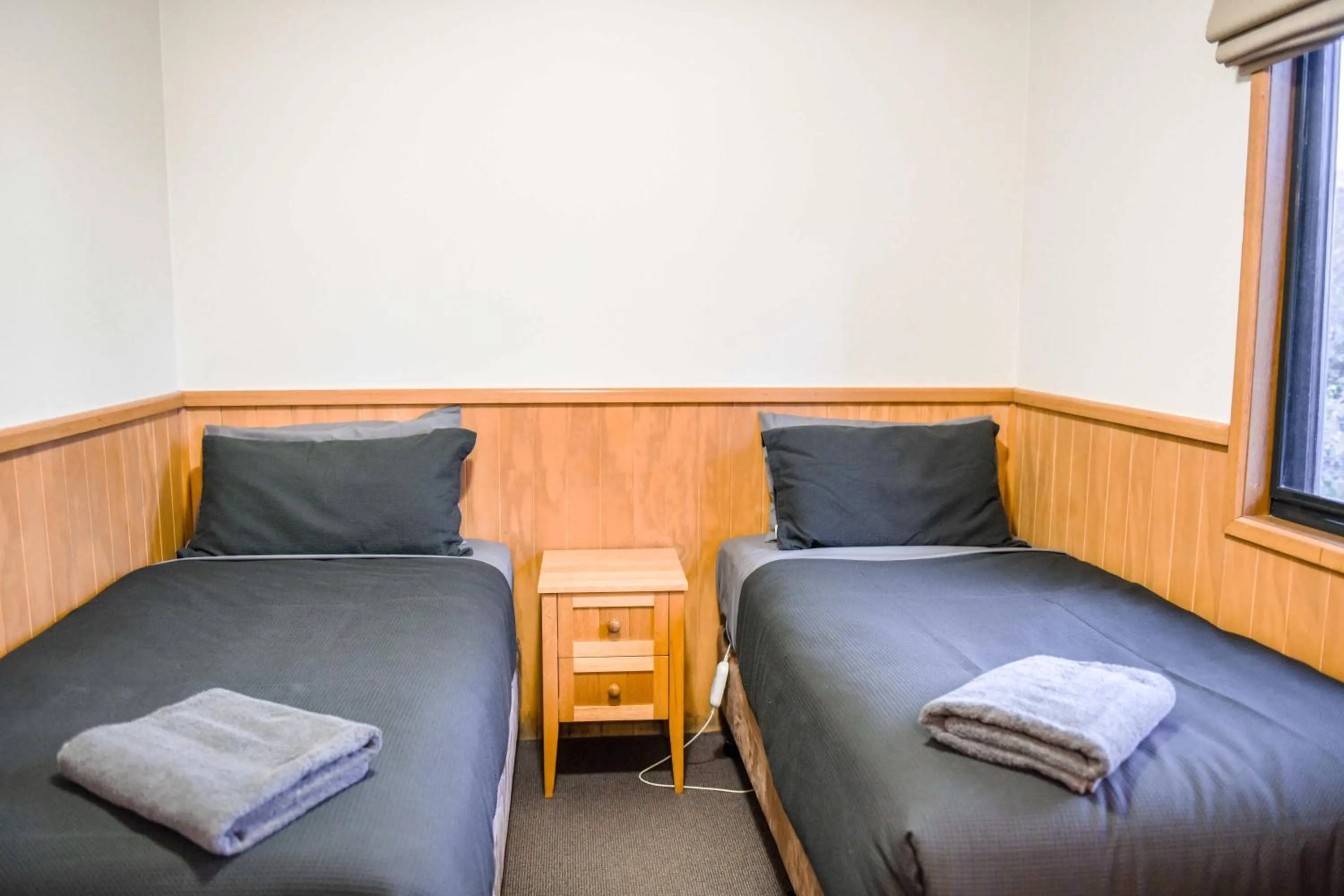 Bed in Cradle Mountain Wilderness Village