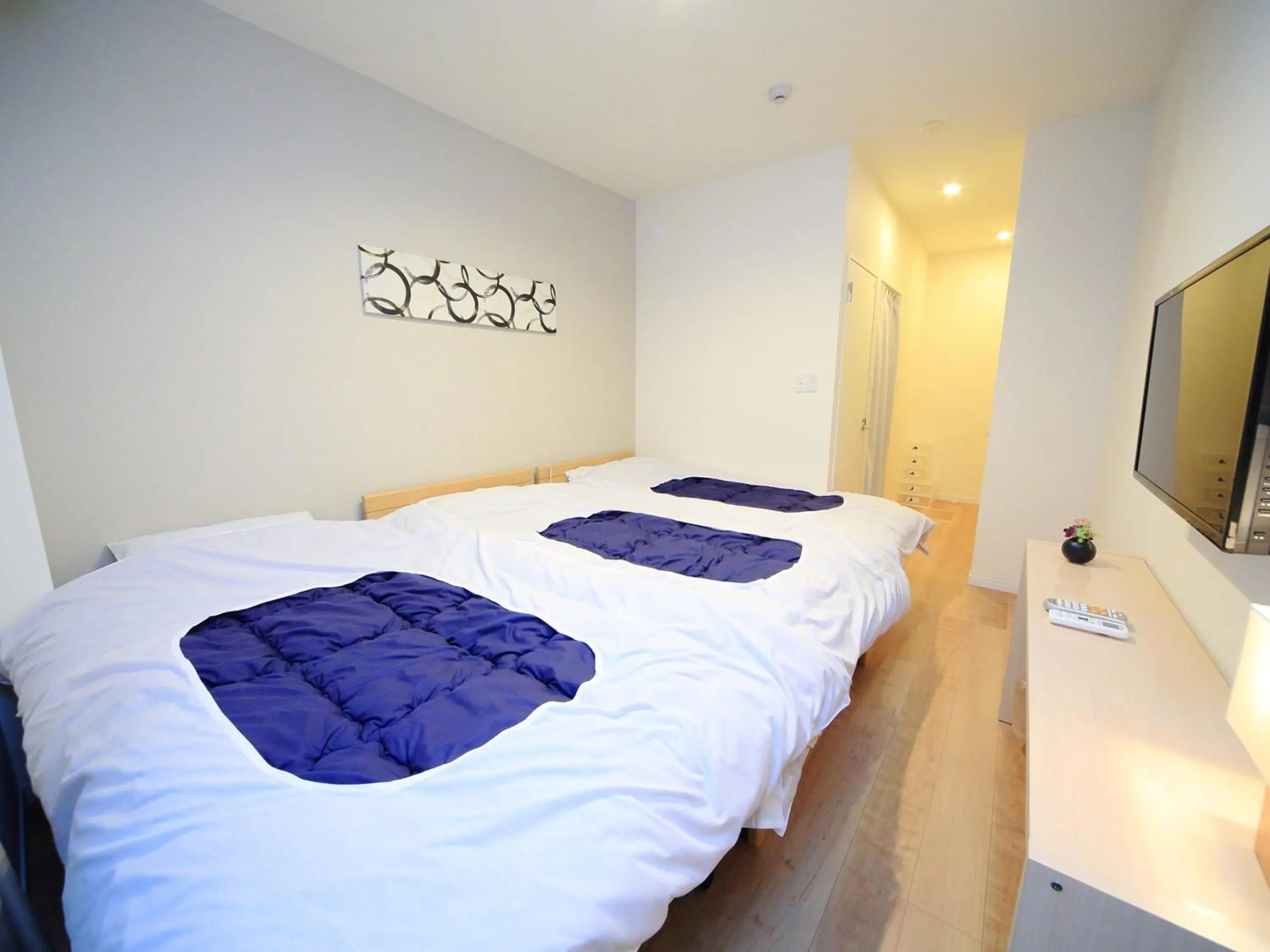 Bed in Kamon Inn Toji Higashi
