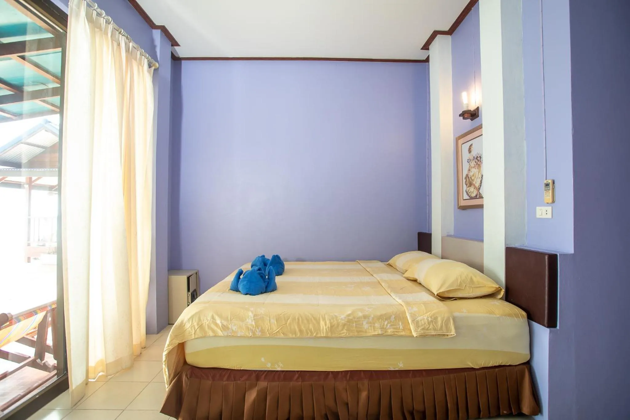 Photo of the whole room, Bed in Rung Arun Resort