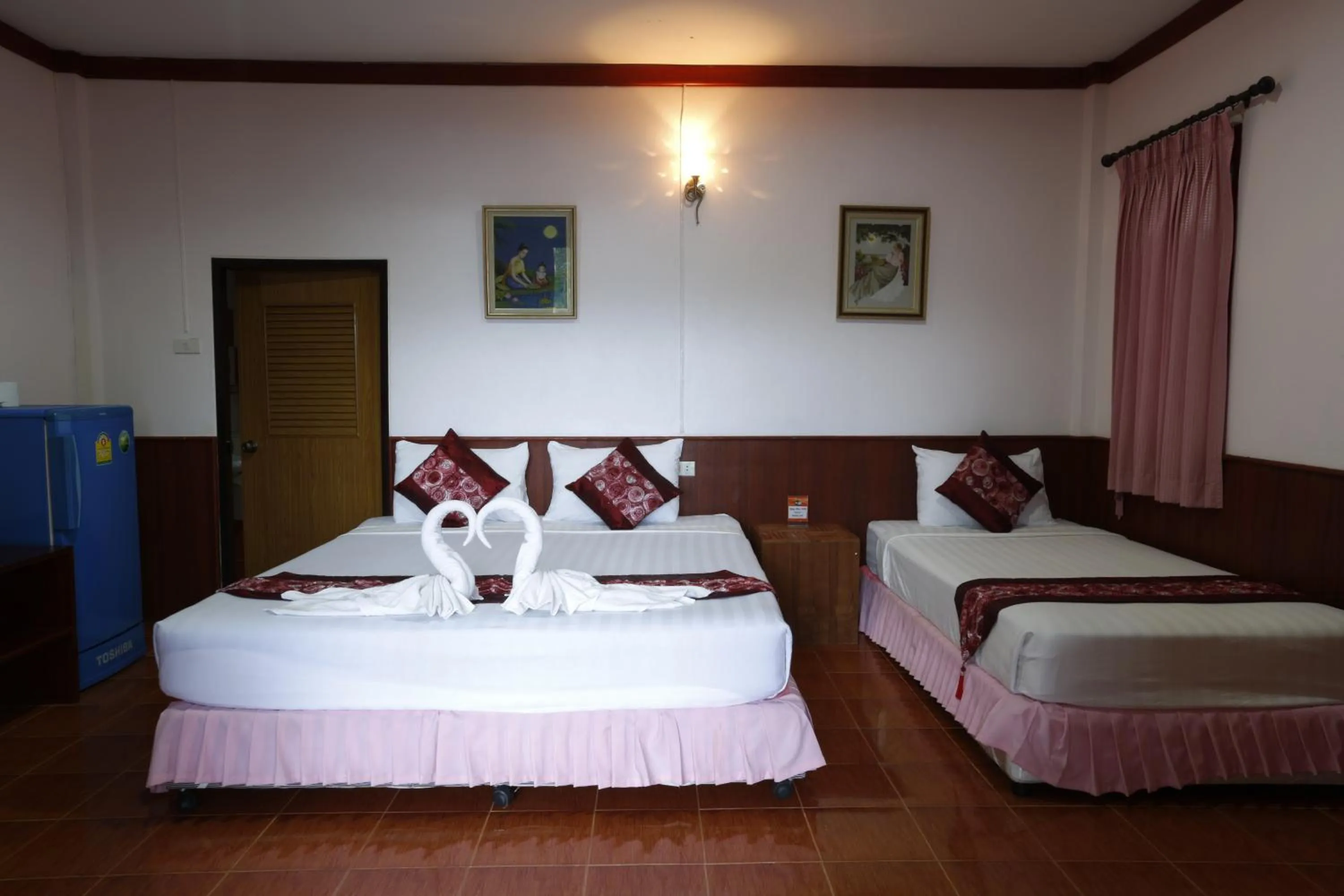 Bed in Rung Arun Resort