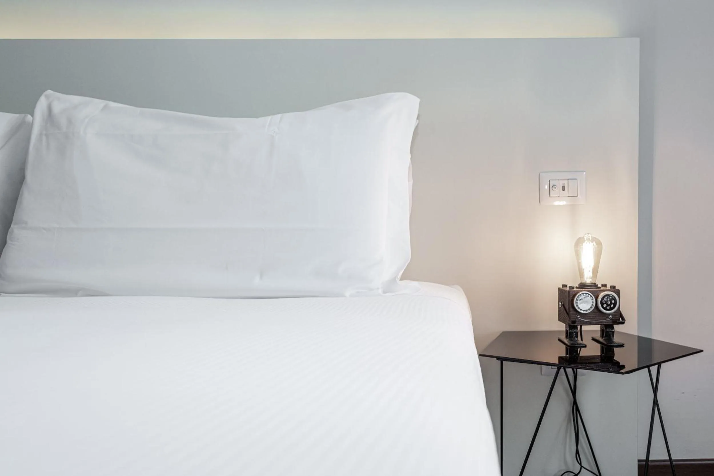 Decorative detail, Bed in Maison Rêve Torino Centro