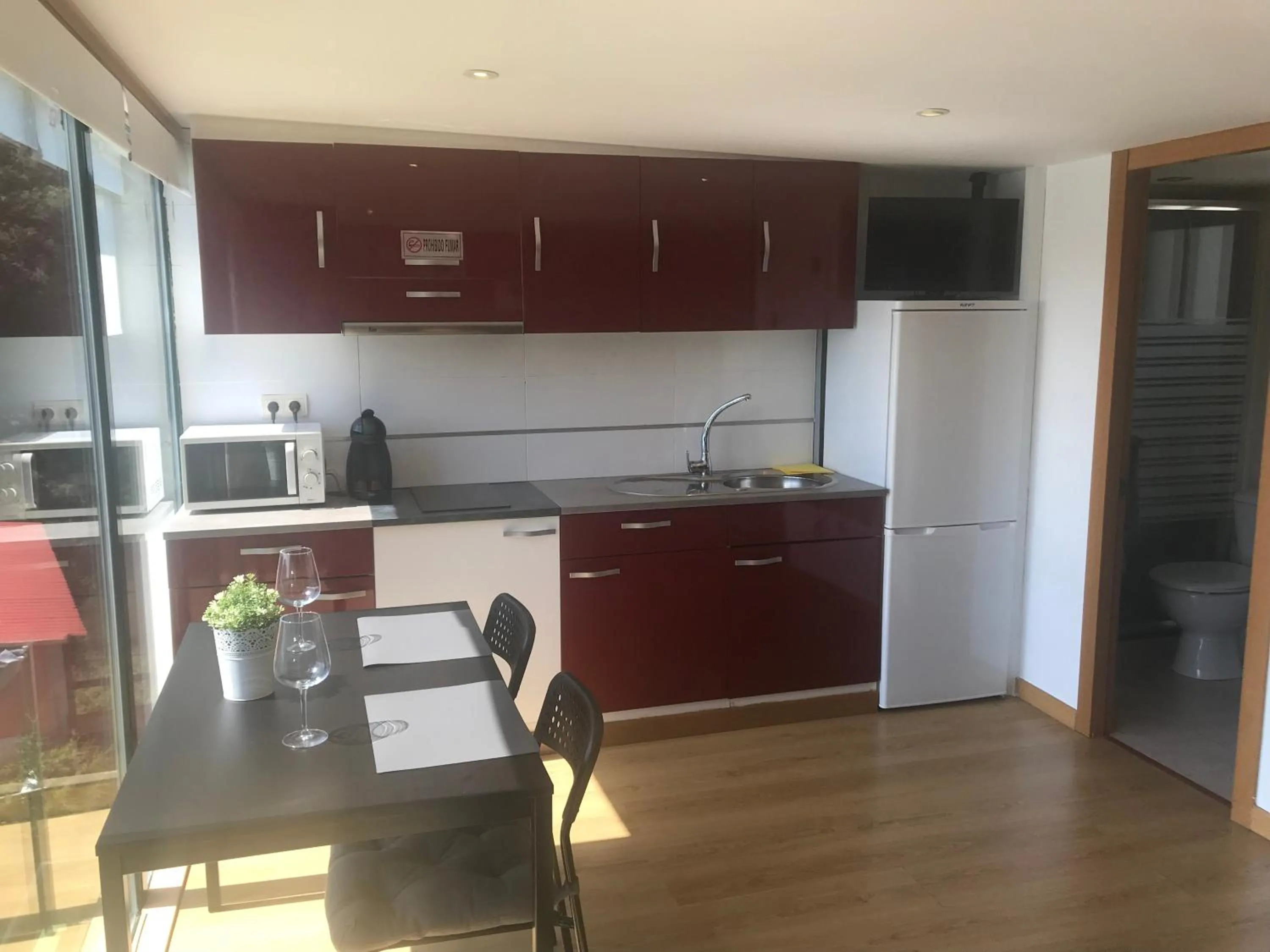 Kitchen or kitchenette in Apartamentos Canabal