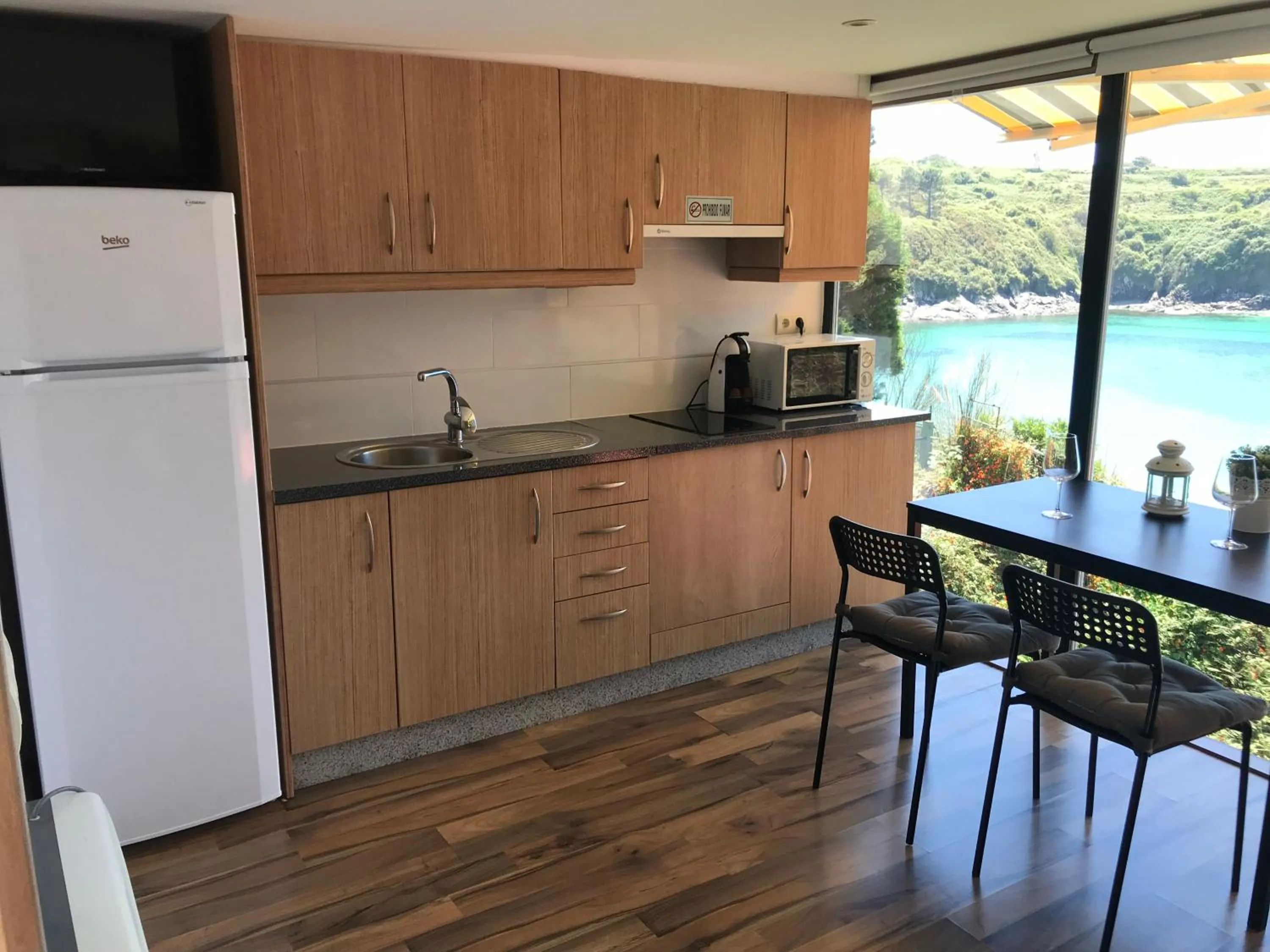 Kitchen or kitchenette in Apartamentos Canabal