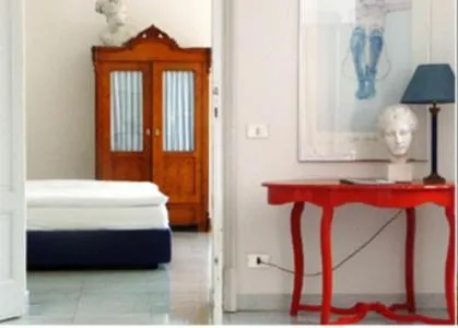 Photo of the whole room, Bed in Residence Ville Lago Lugano