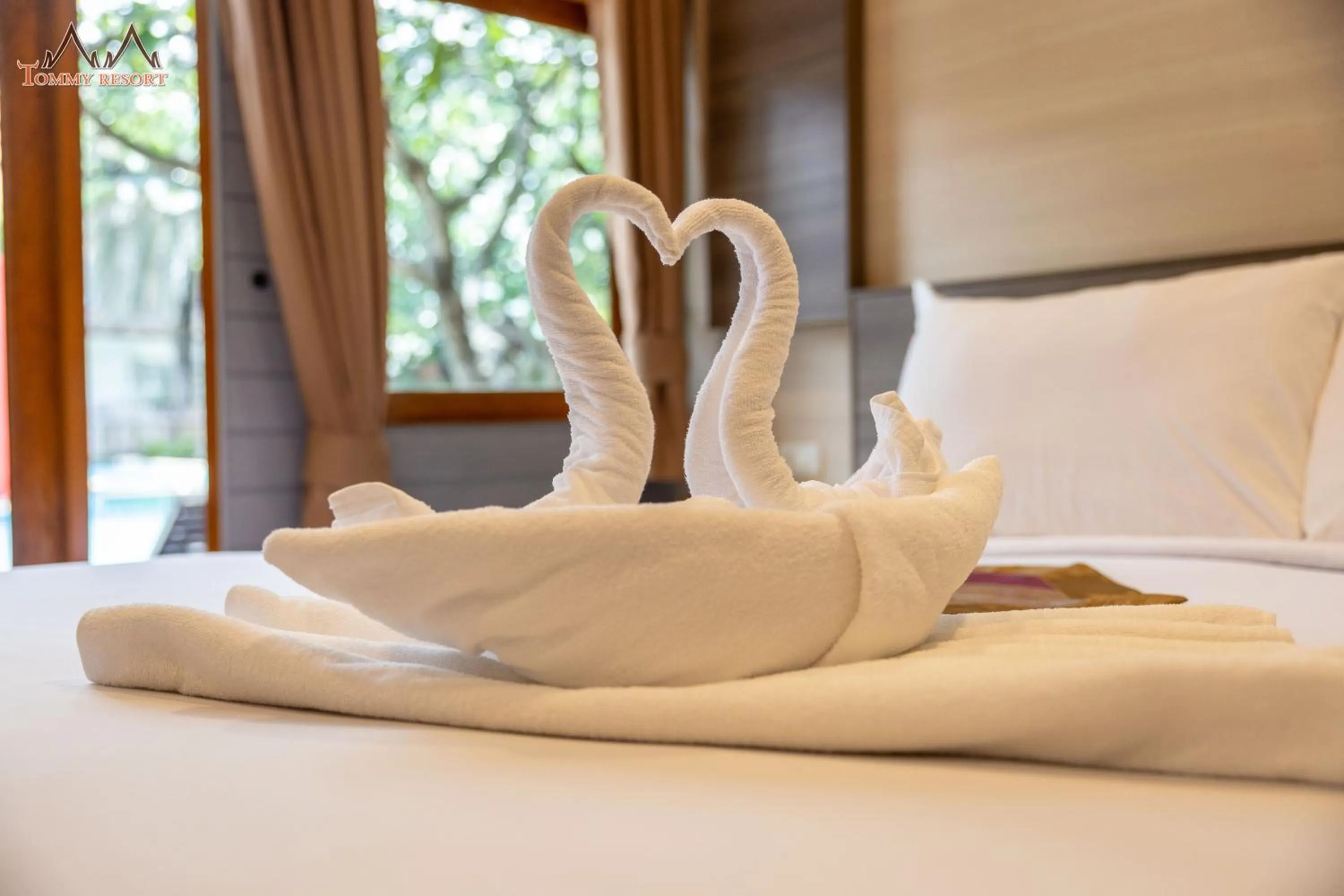 Property building, Bed in Tommy Resort