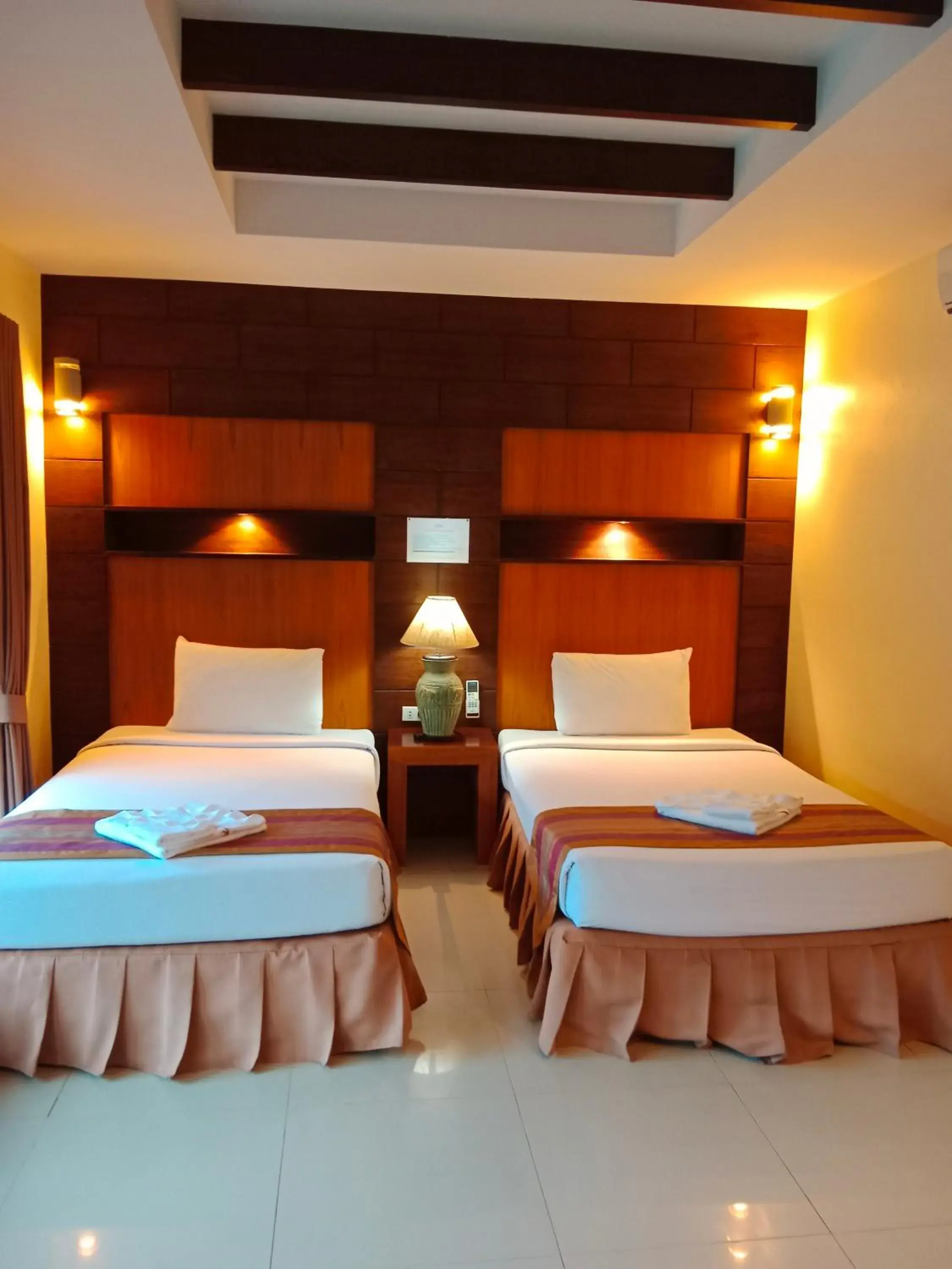 Property building, Bed in Tommy Resort Property building, Bed in Tommy Resort