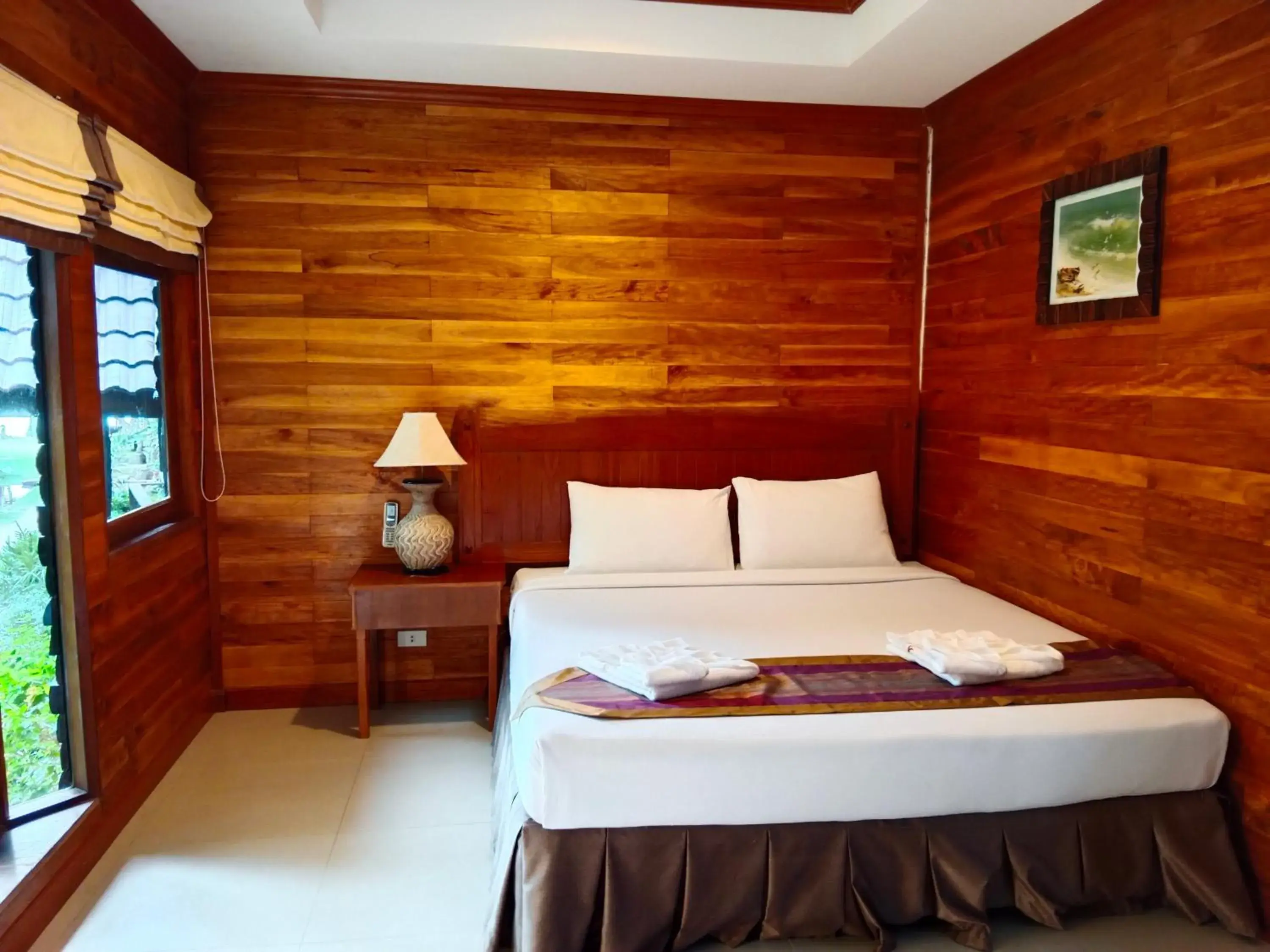 Property building, Bed in Tommy Resort Property building, Bed in Tommy Resort