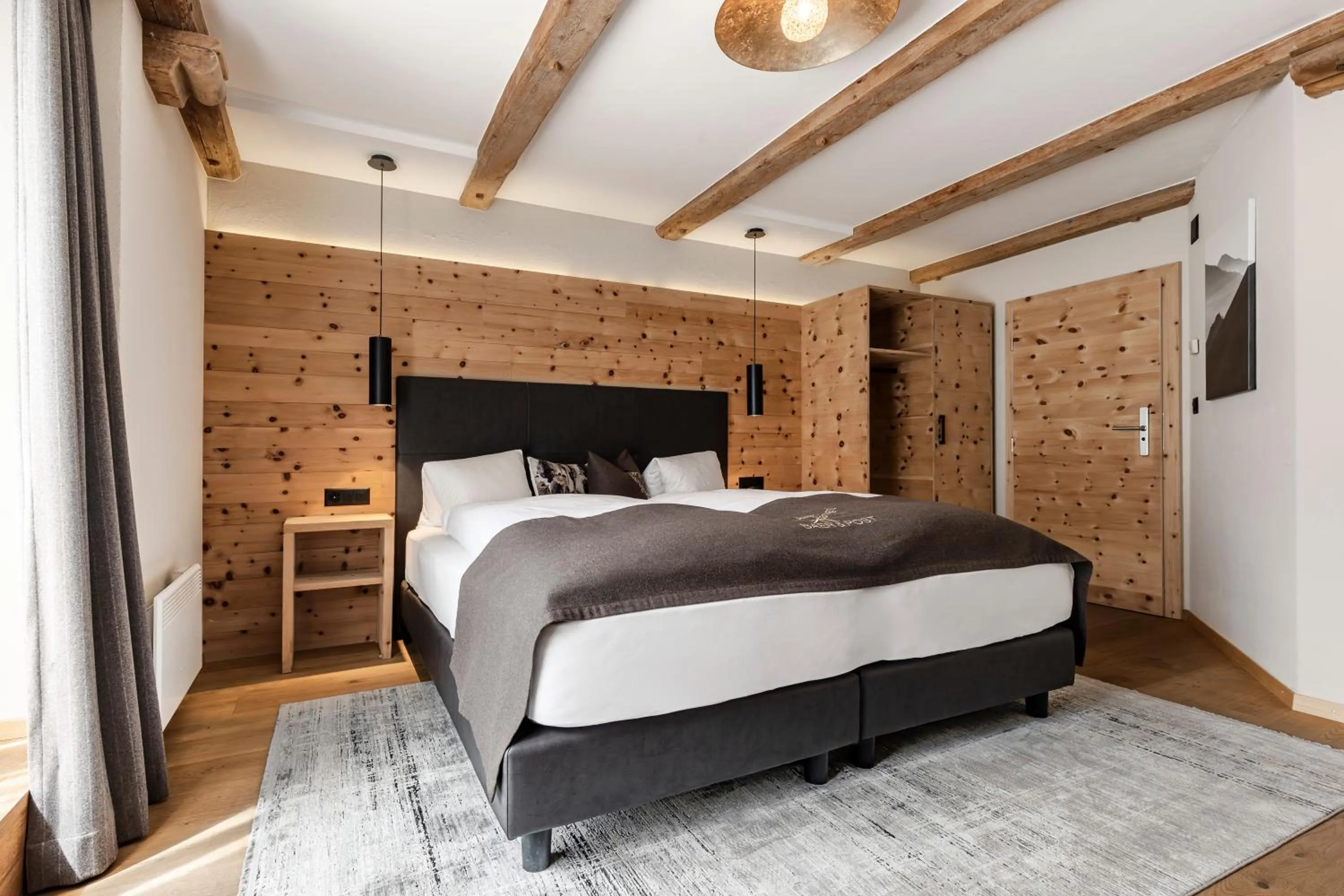 Photo of the whole room, Bed in Hotel Baer & Post Zernez