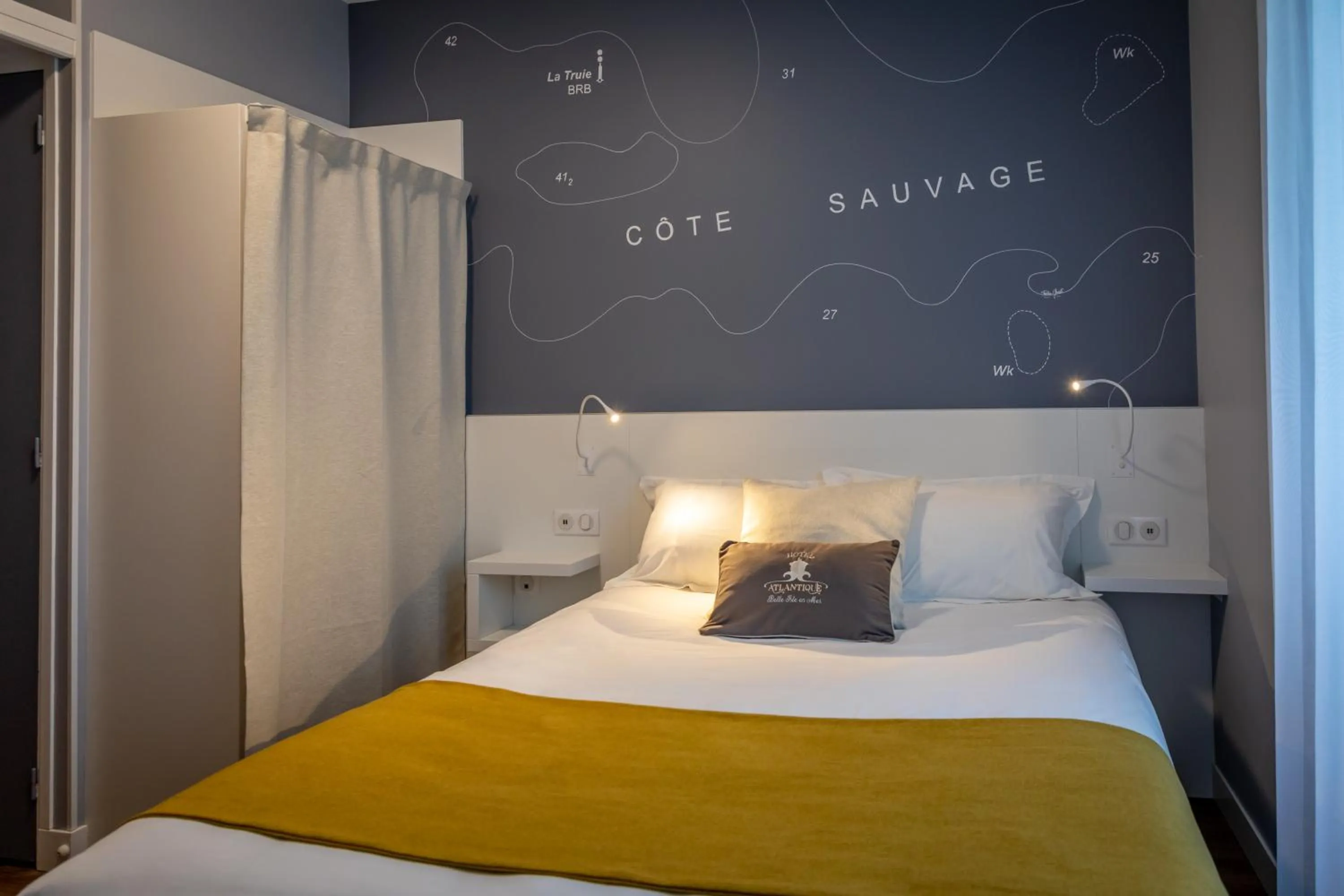 Bed in Hotel Atlantique